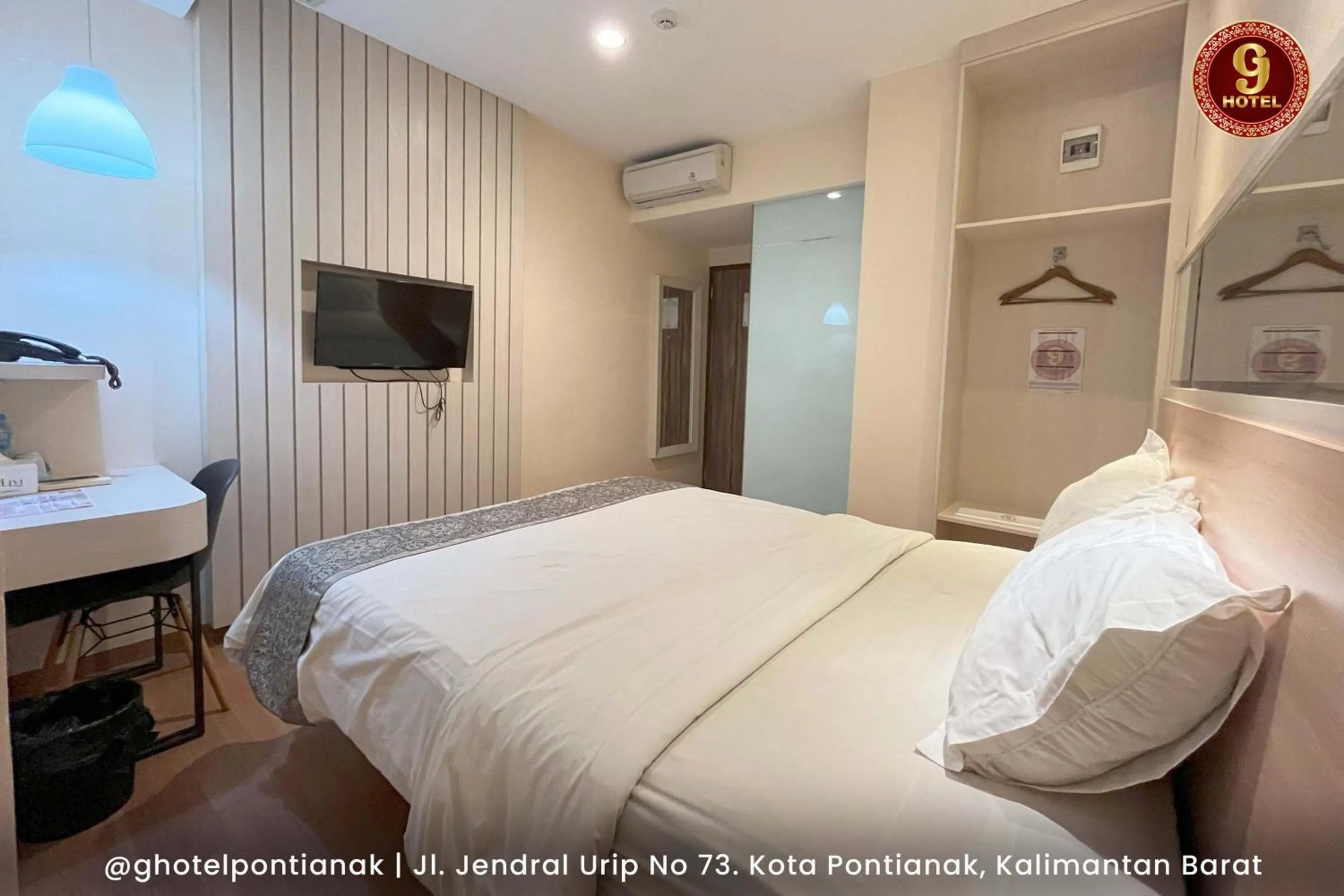 Bed in G-Hotel Pontianak