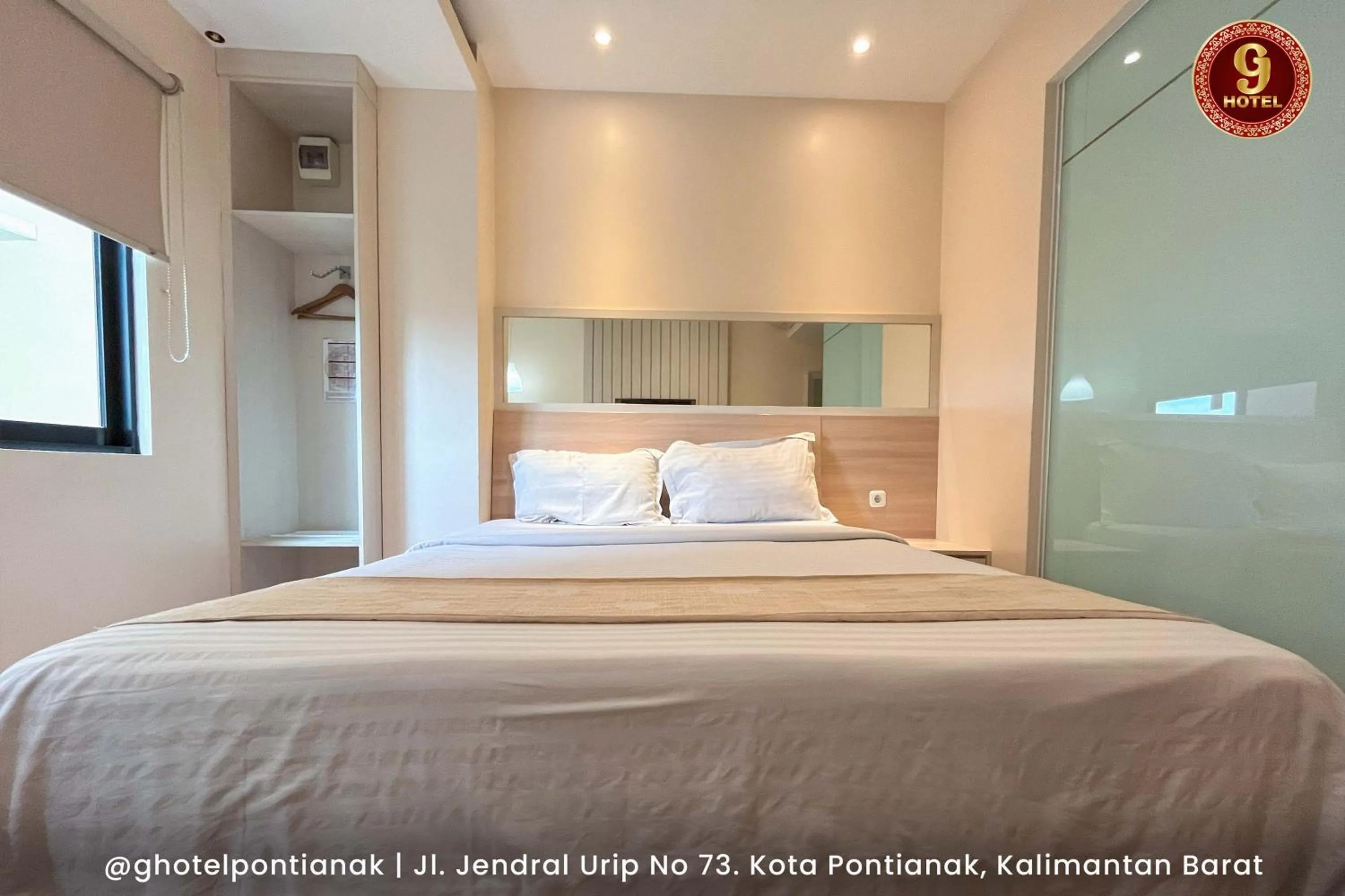 Bed in G-Hotel Pontianak