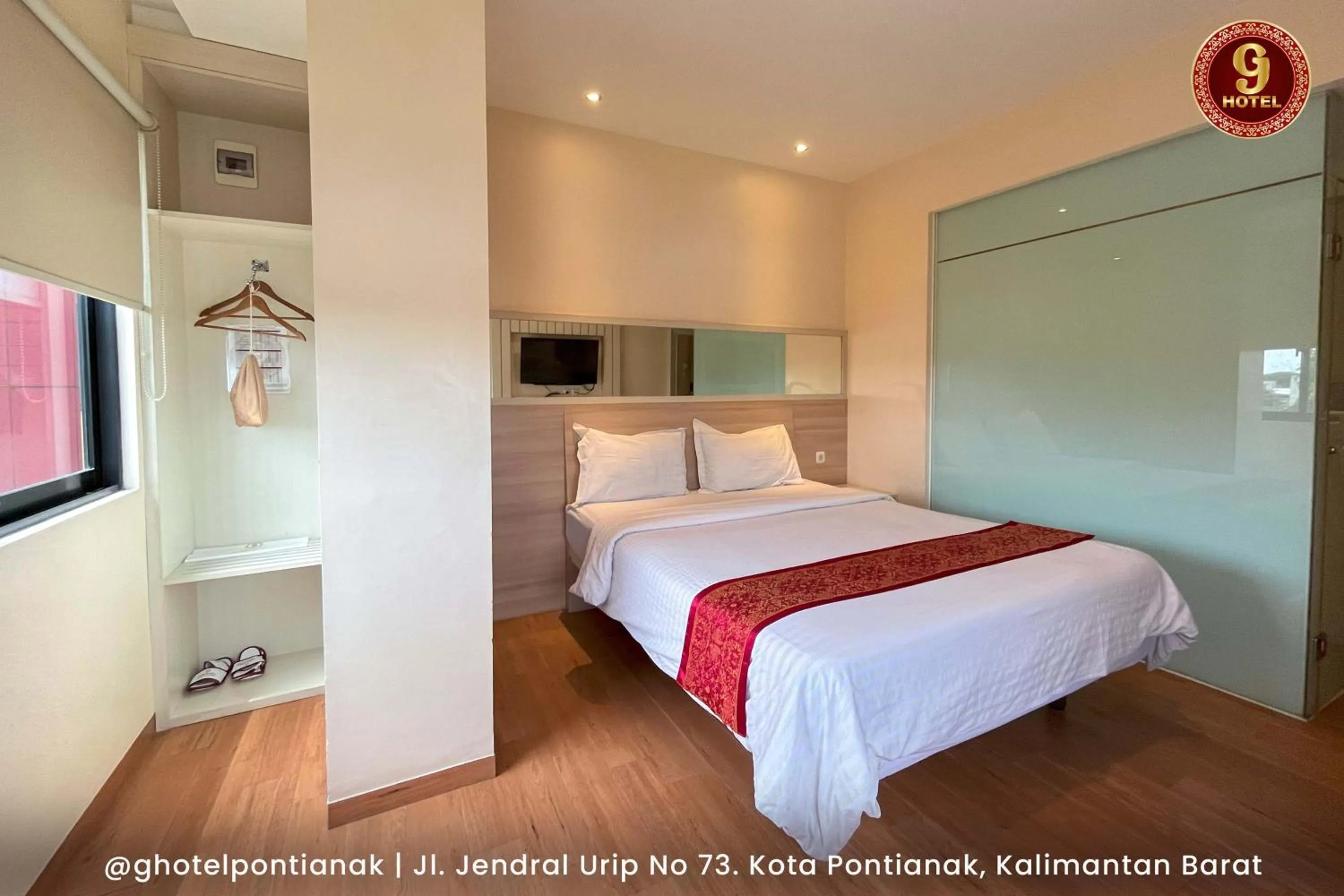 Bed in G-Hotel Pontianak