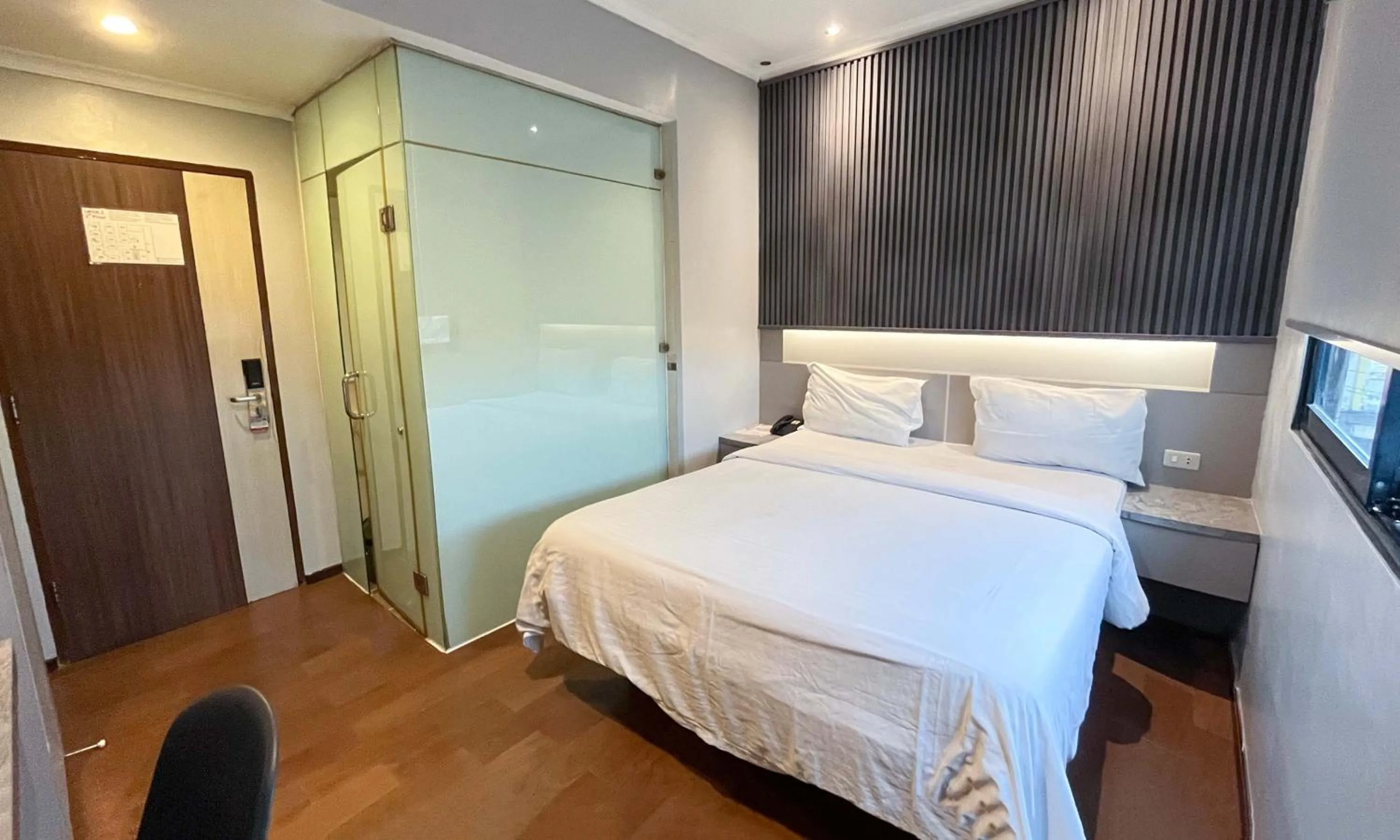 Bed in G-Hotel Pontianak