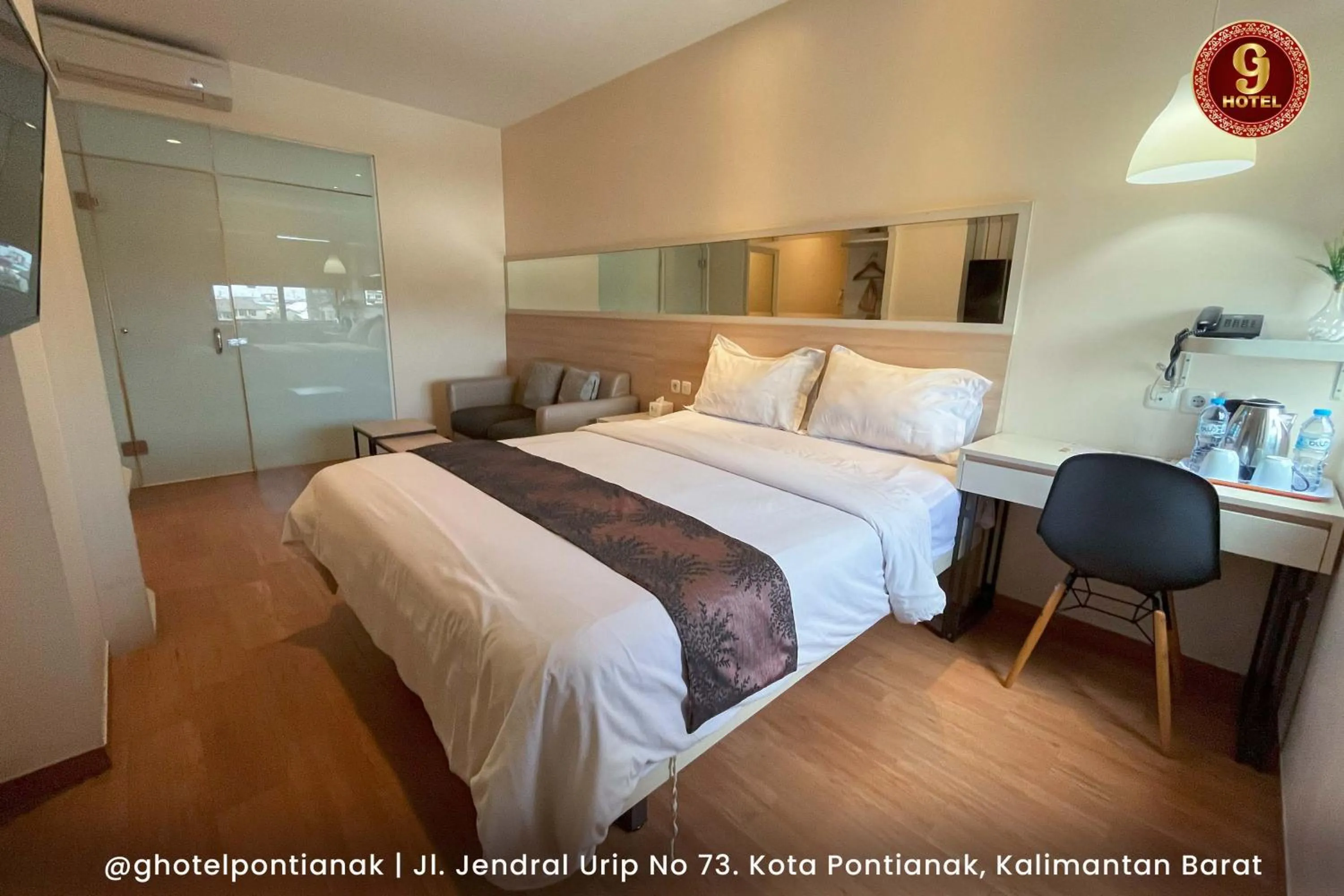 Bed in G-Hotel Pontianak