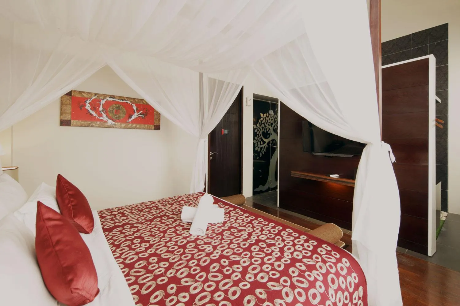 Bed in 18 Suite Villa Kuta