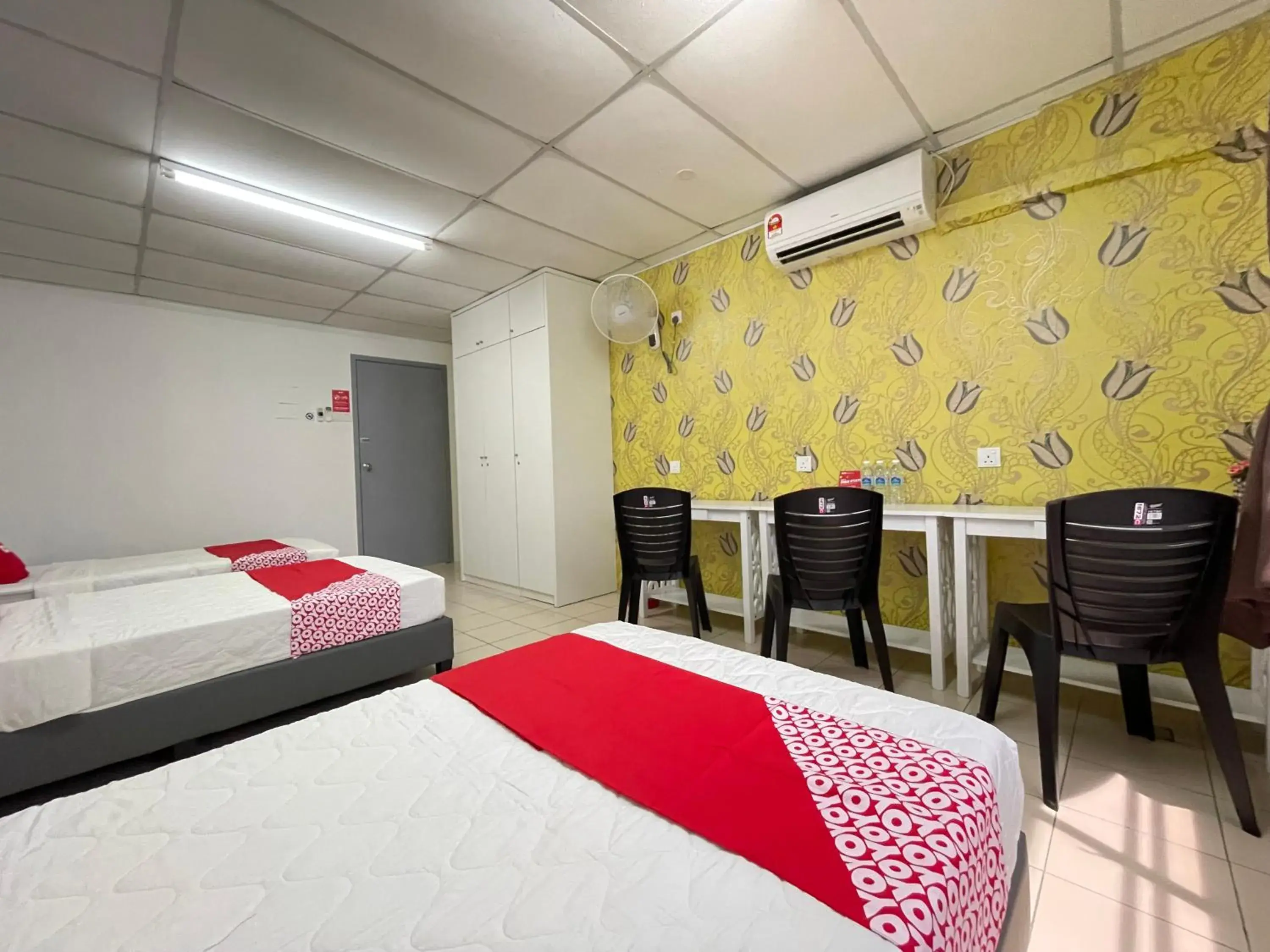 Triple Room with Shared Bathroom in Hotel O Wg Guest House Triple Room with Shared Bathroom in Hotel O Wg Guest House