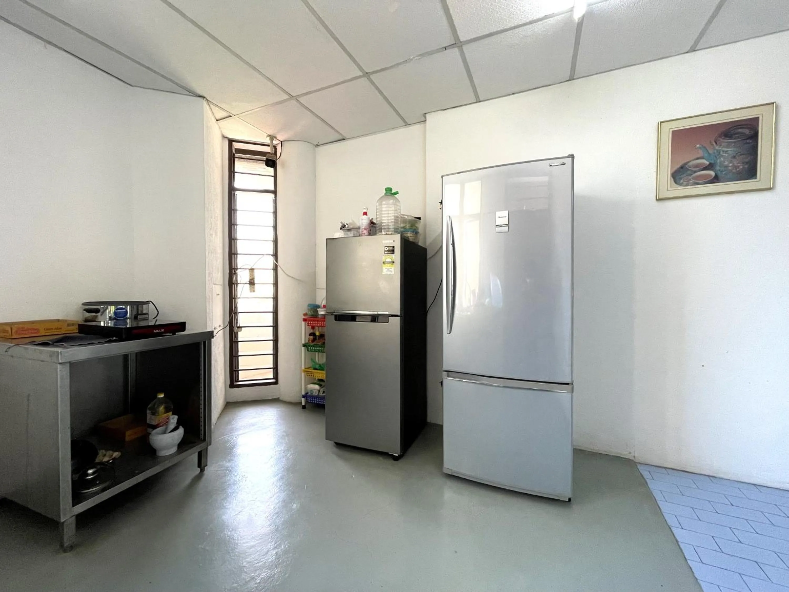 Kitchen or kitchenette in Hotel O Wg Guest House