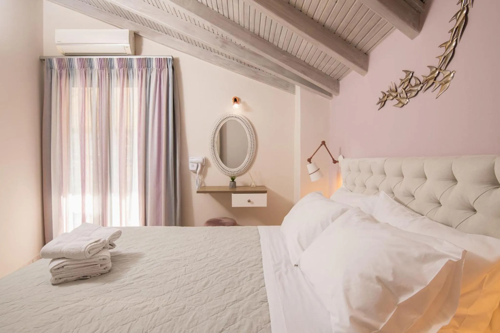 Bed in Koukos Loft Apartments