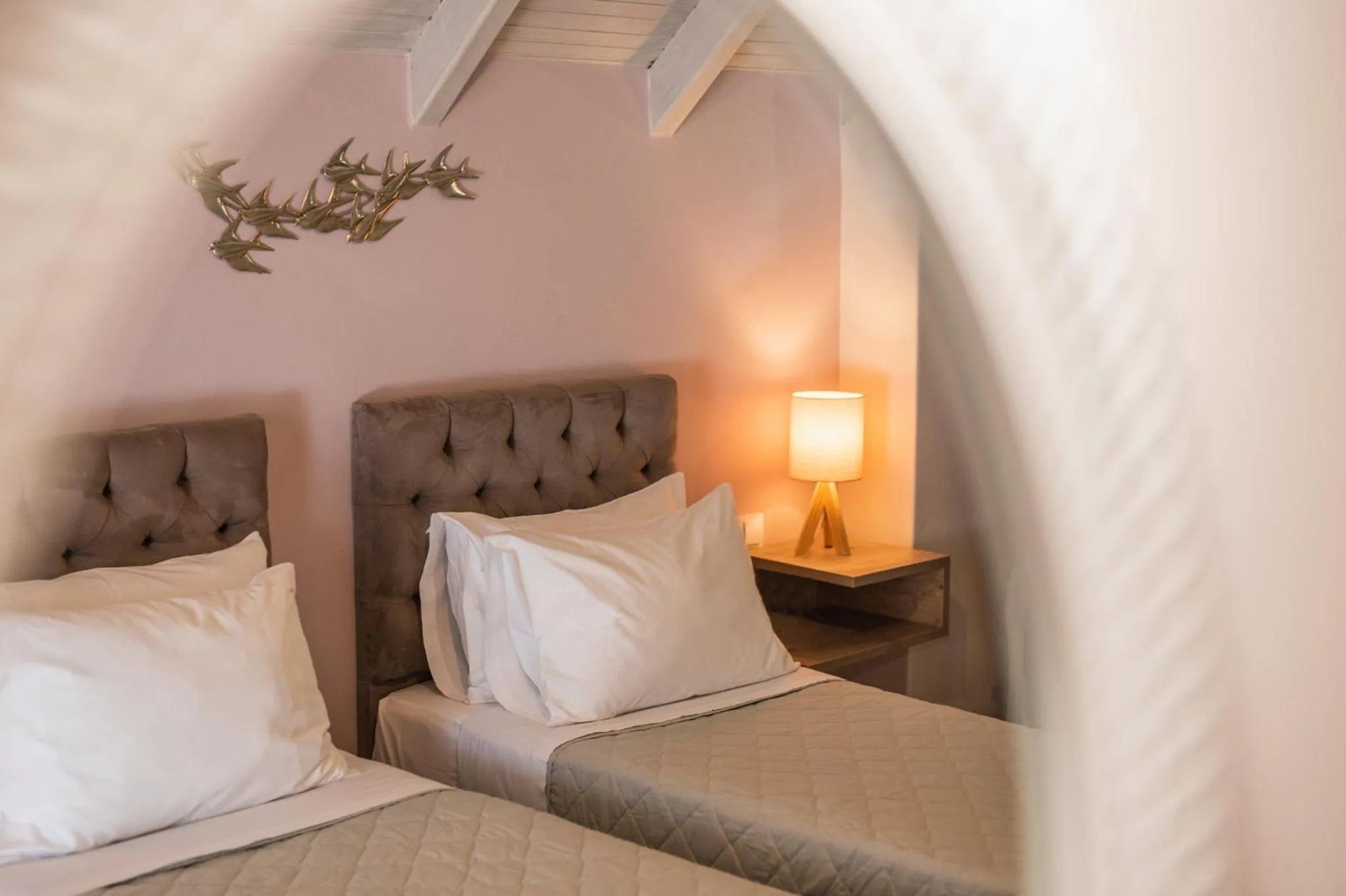 Bed in Koukos Loft Apartments