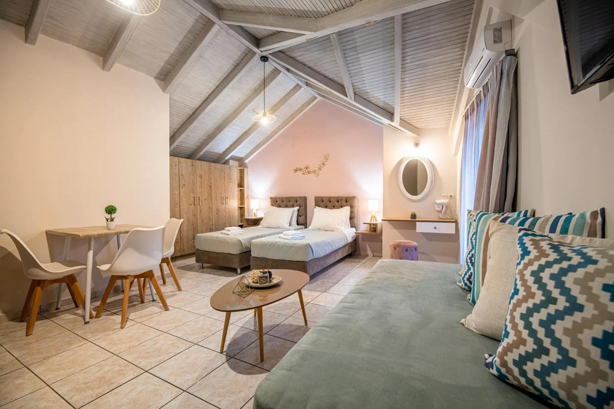 Bed in Koukos Loft Apartments