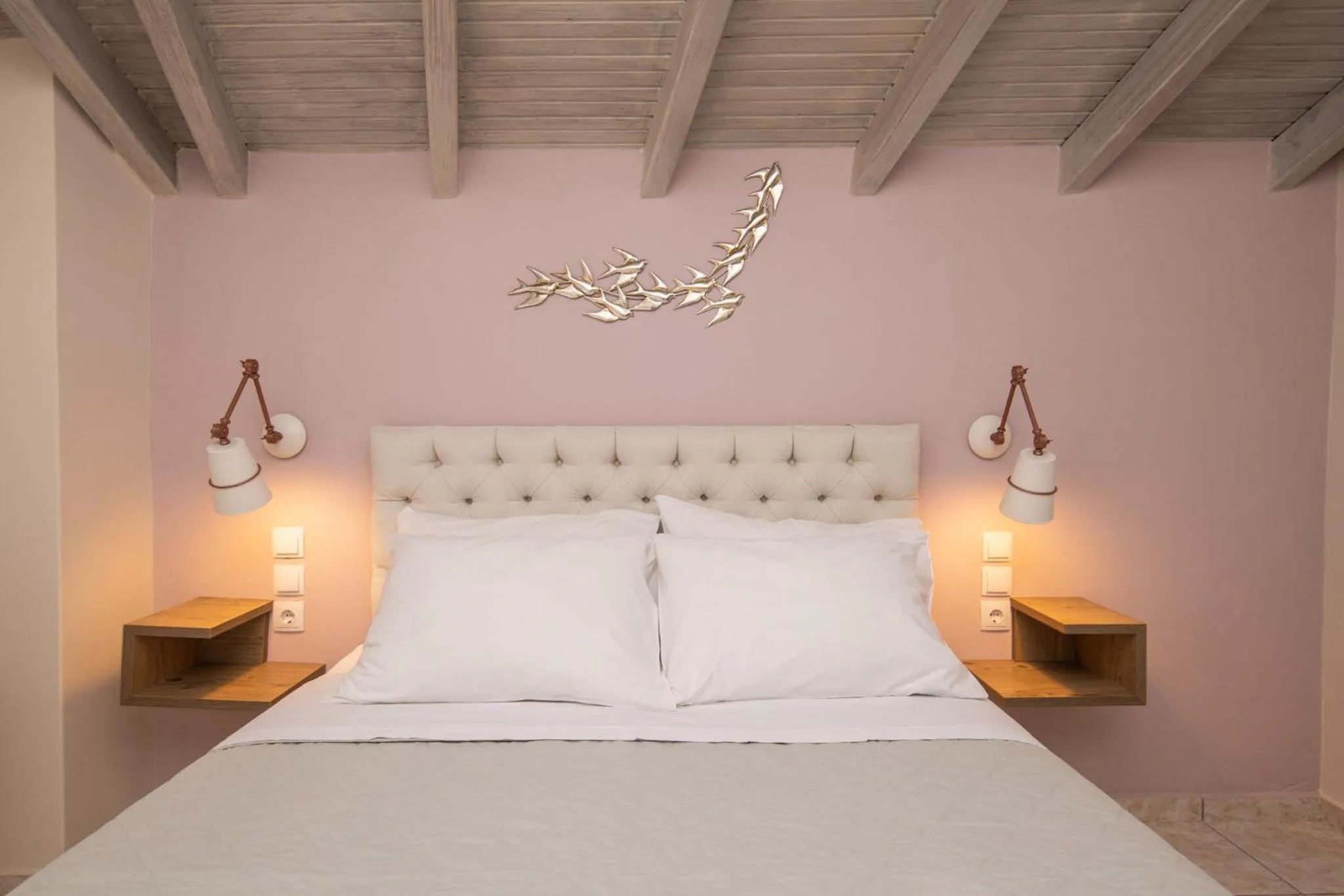 Bed in Koukos Loft Apartments