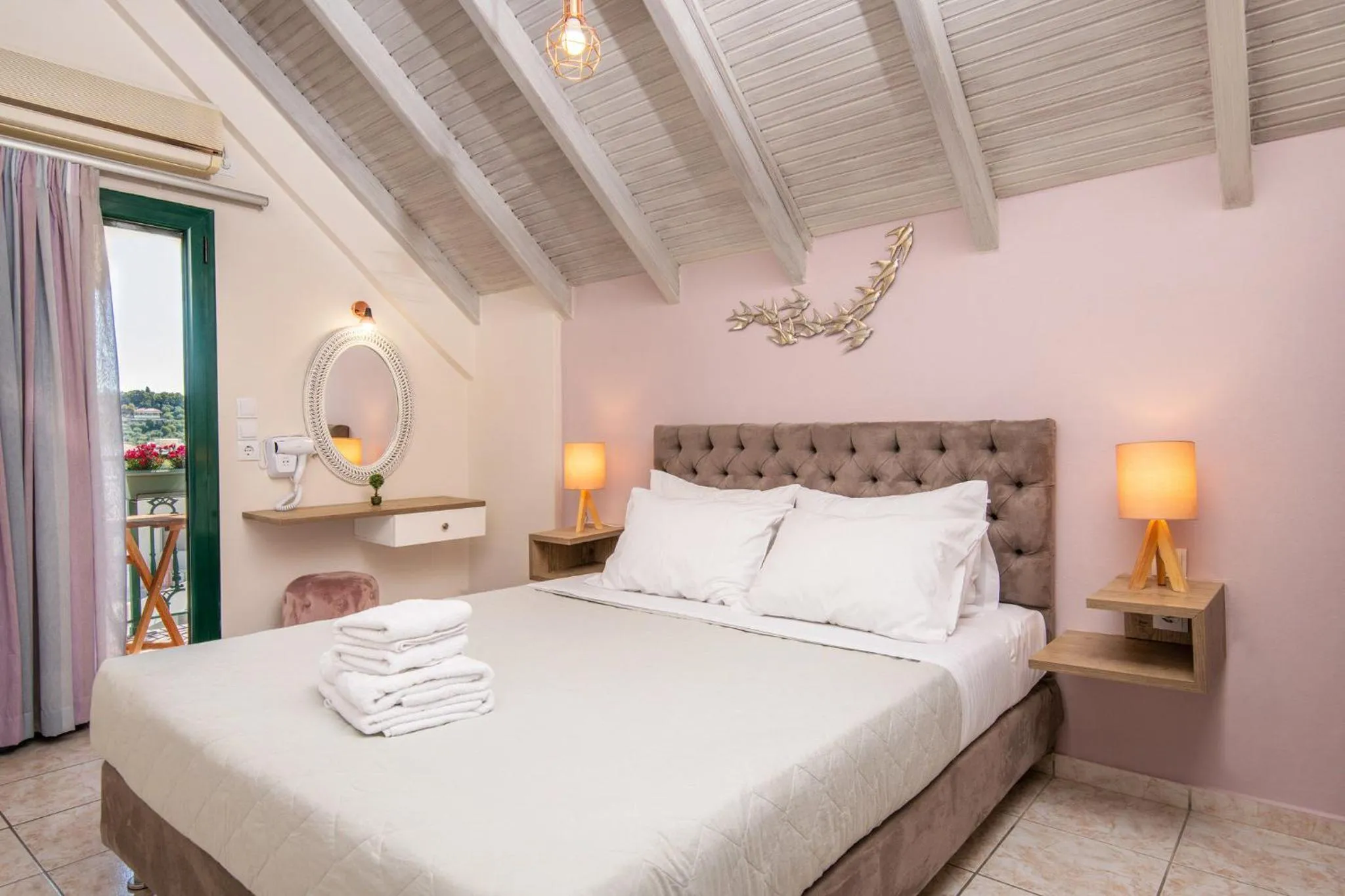 Bed in Koukos Loft Apartments