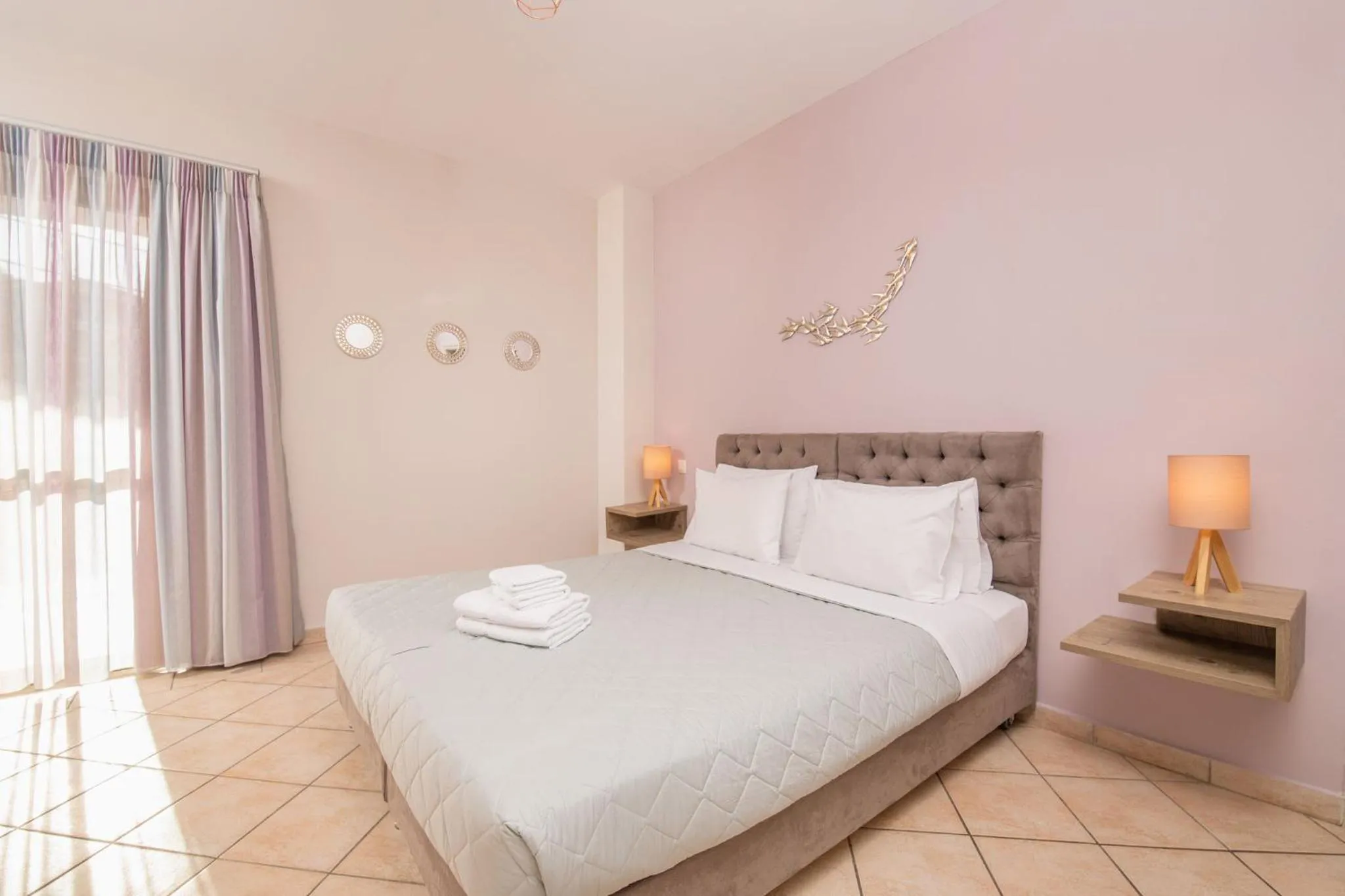 Bed in Koukos Loft Apartments