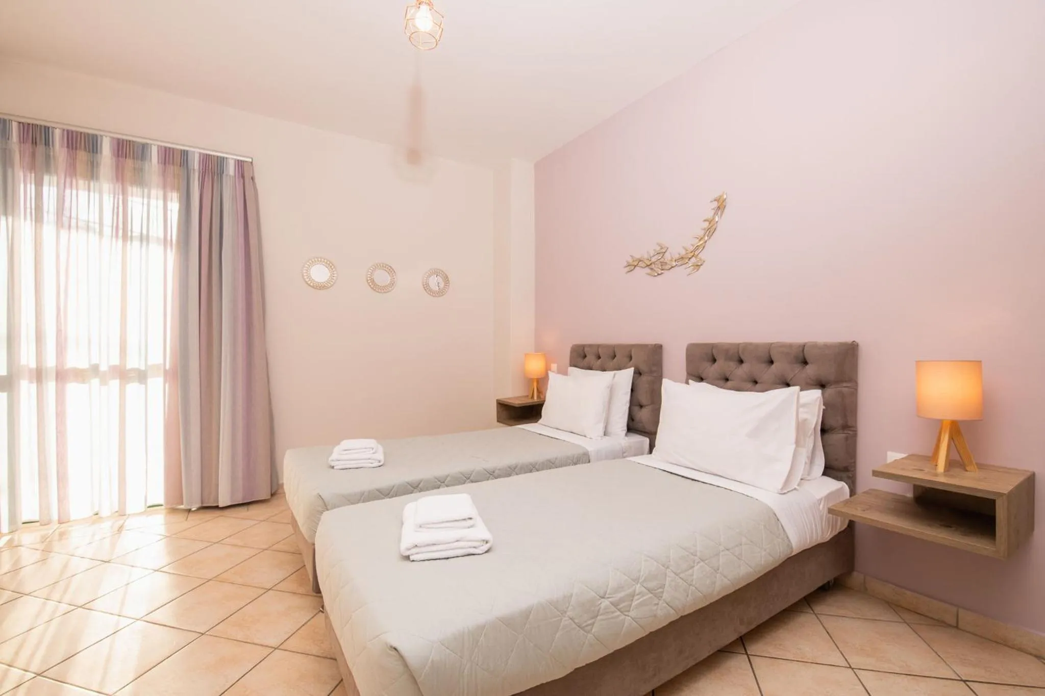 Bed in Koukos Loft Apartments