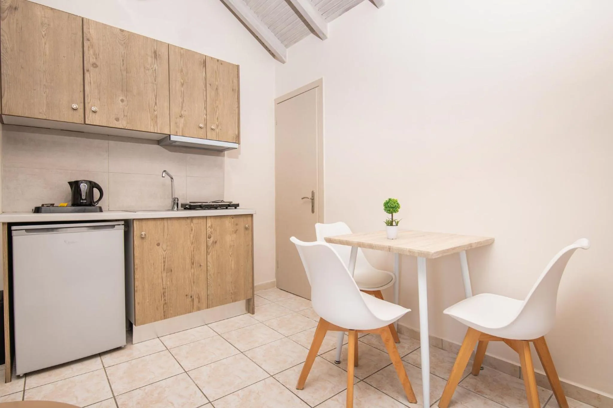 Kitchen or kitchenette in Koukos Loft Apartments