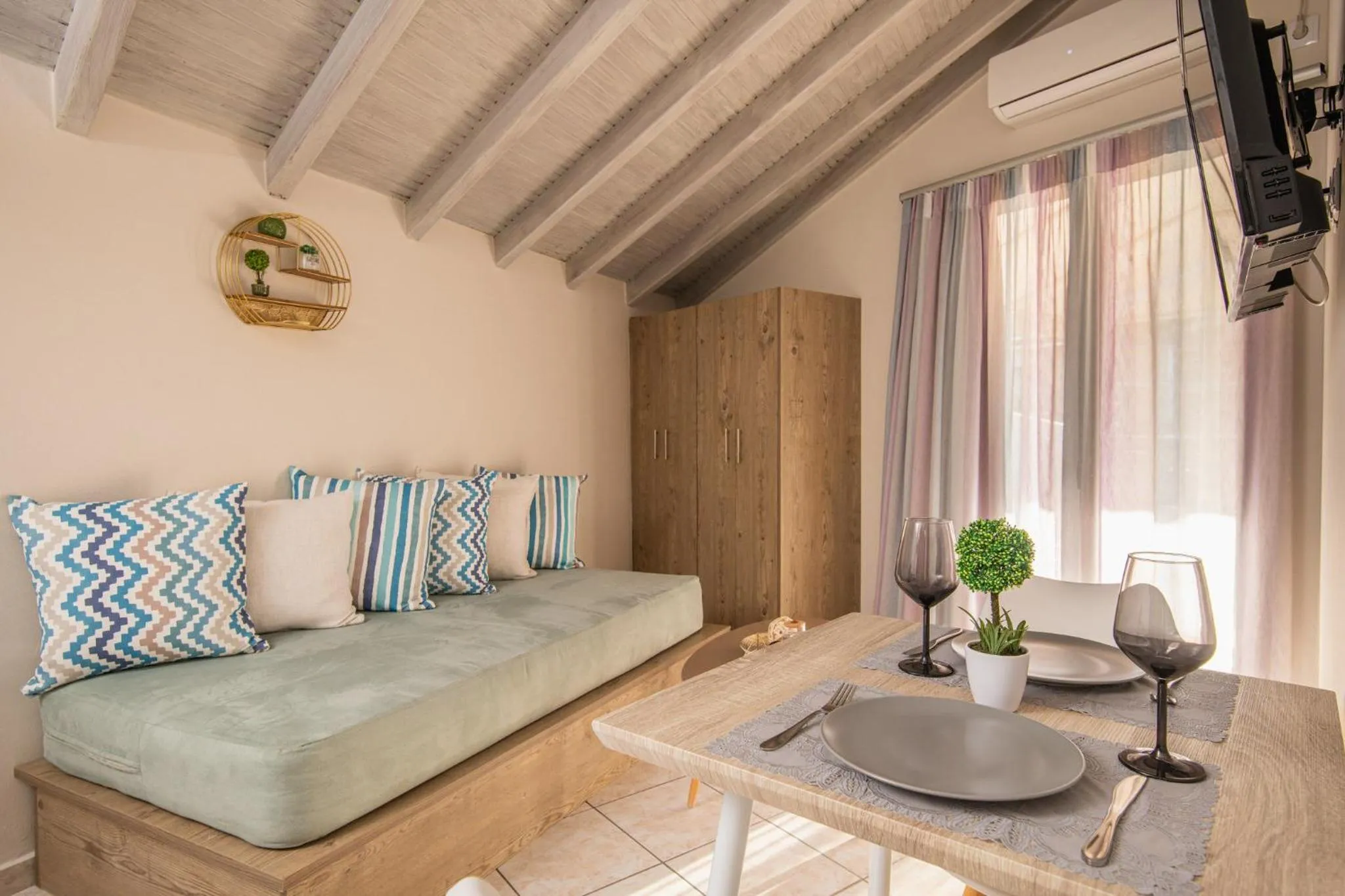 Living room, Bed in Koukos Loft Apartments