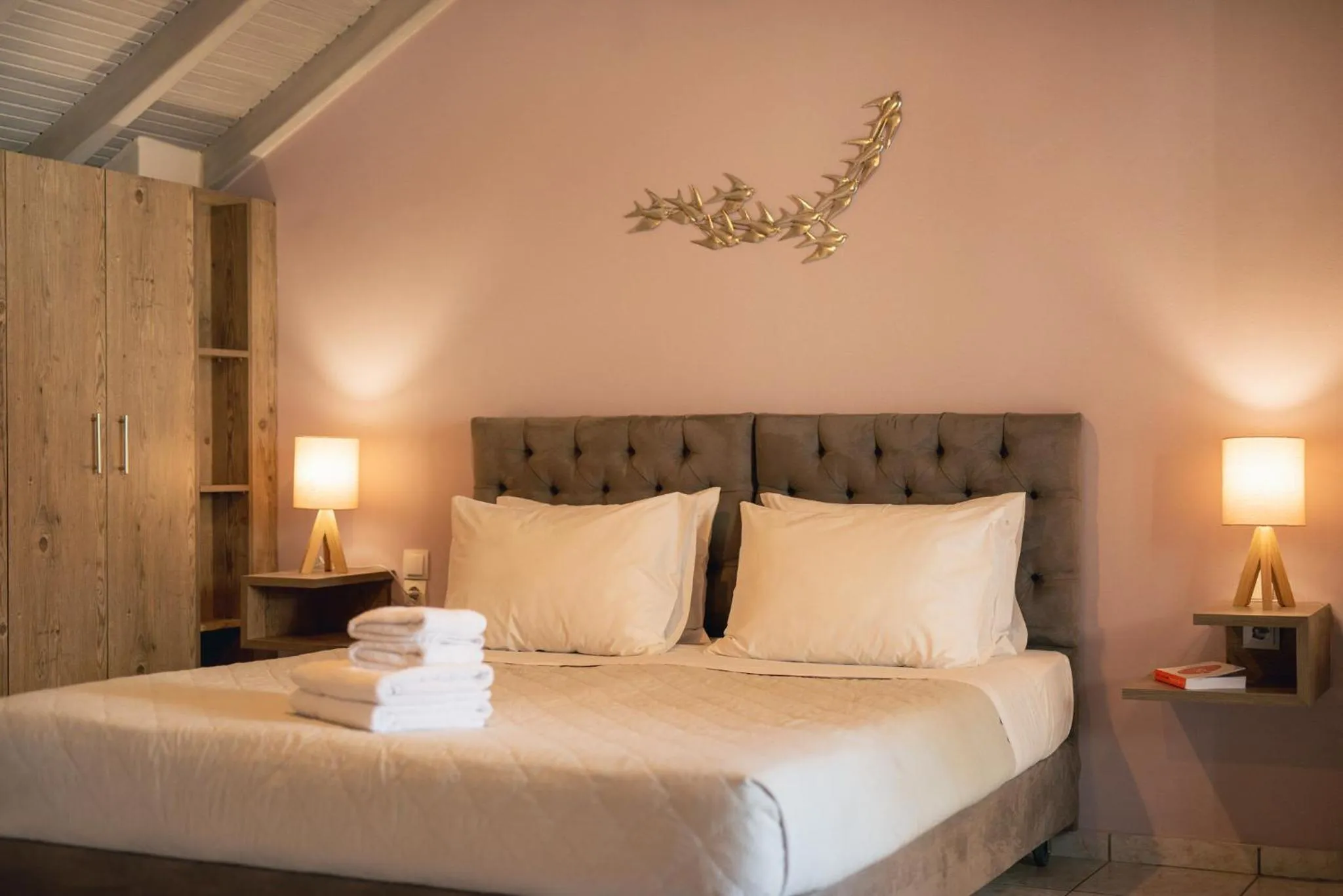 Bed in Koukos Loft Apartments