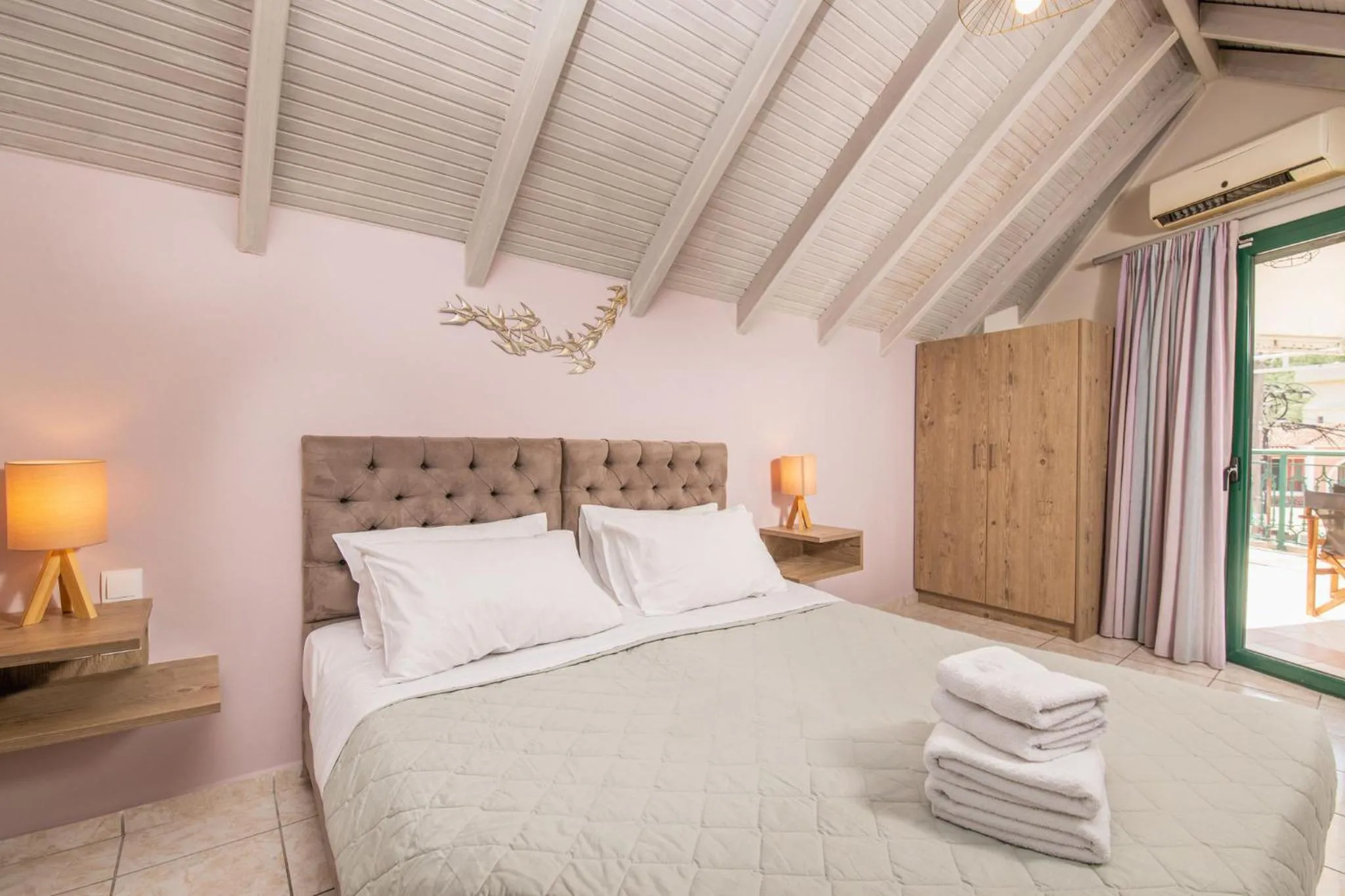 Bed in Koukos Loft Apartments