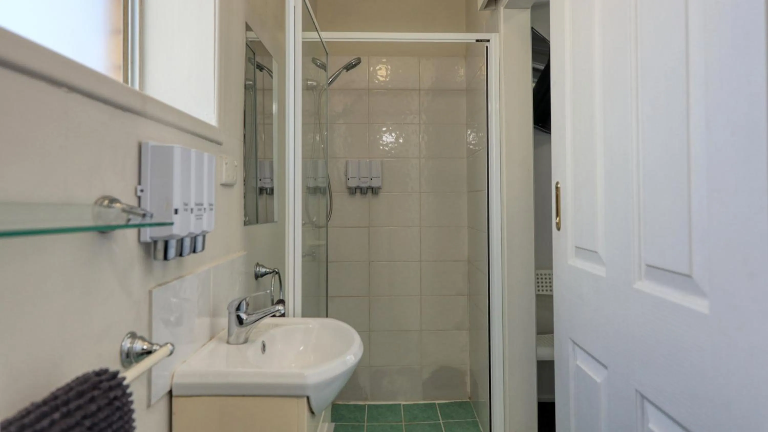 Shower in Oasis Motel