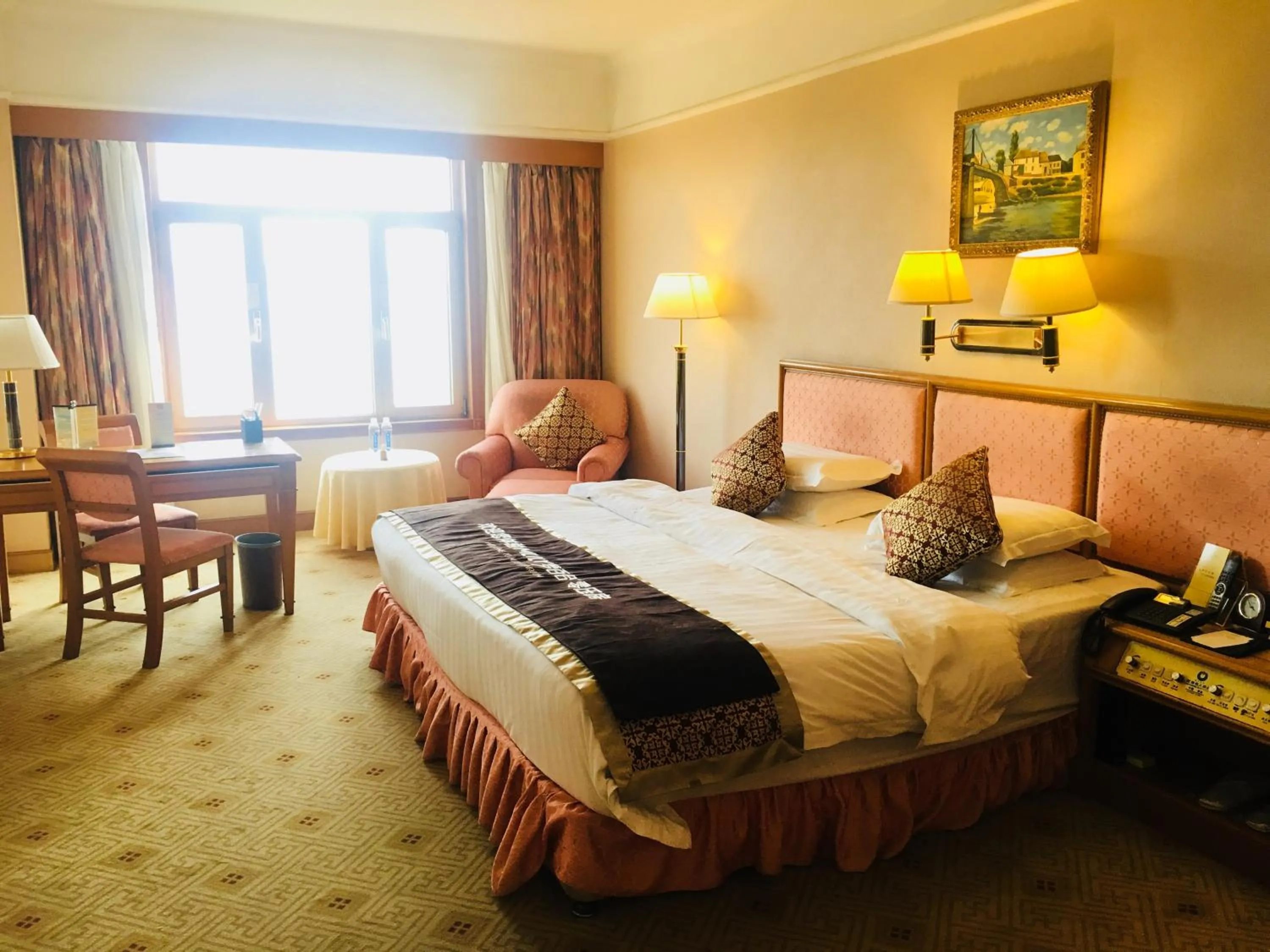 Bed in Qingdao Oceanwide Elite Hotel