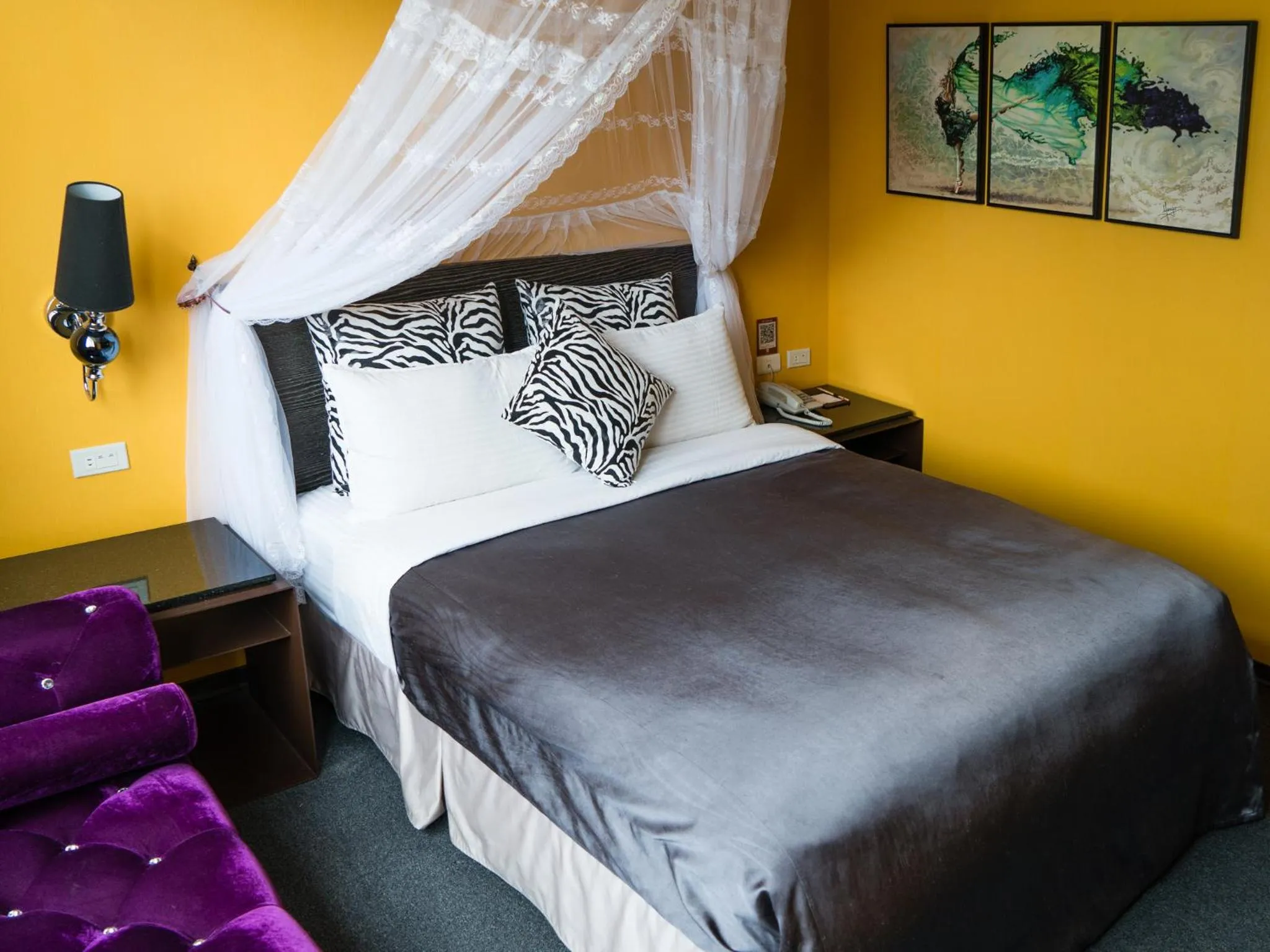 Bed in E-House Hotel