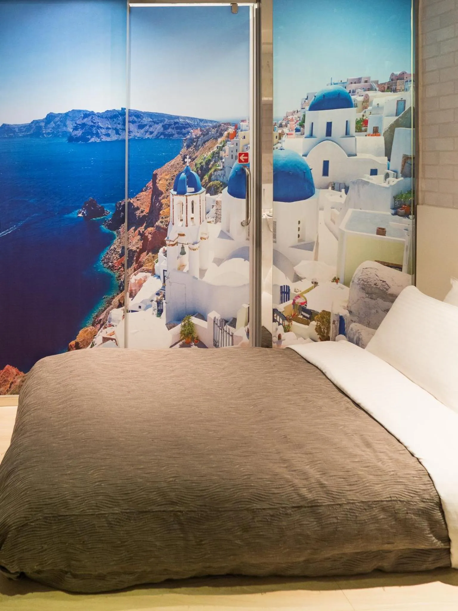 Bed in E-House Hotel