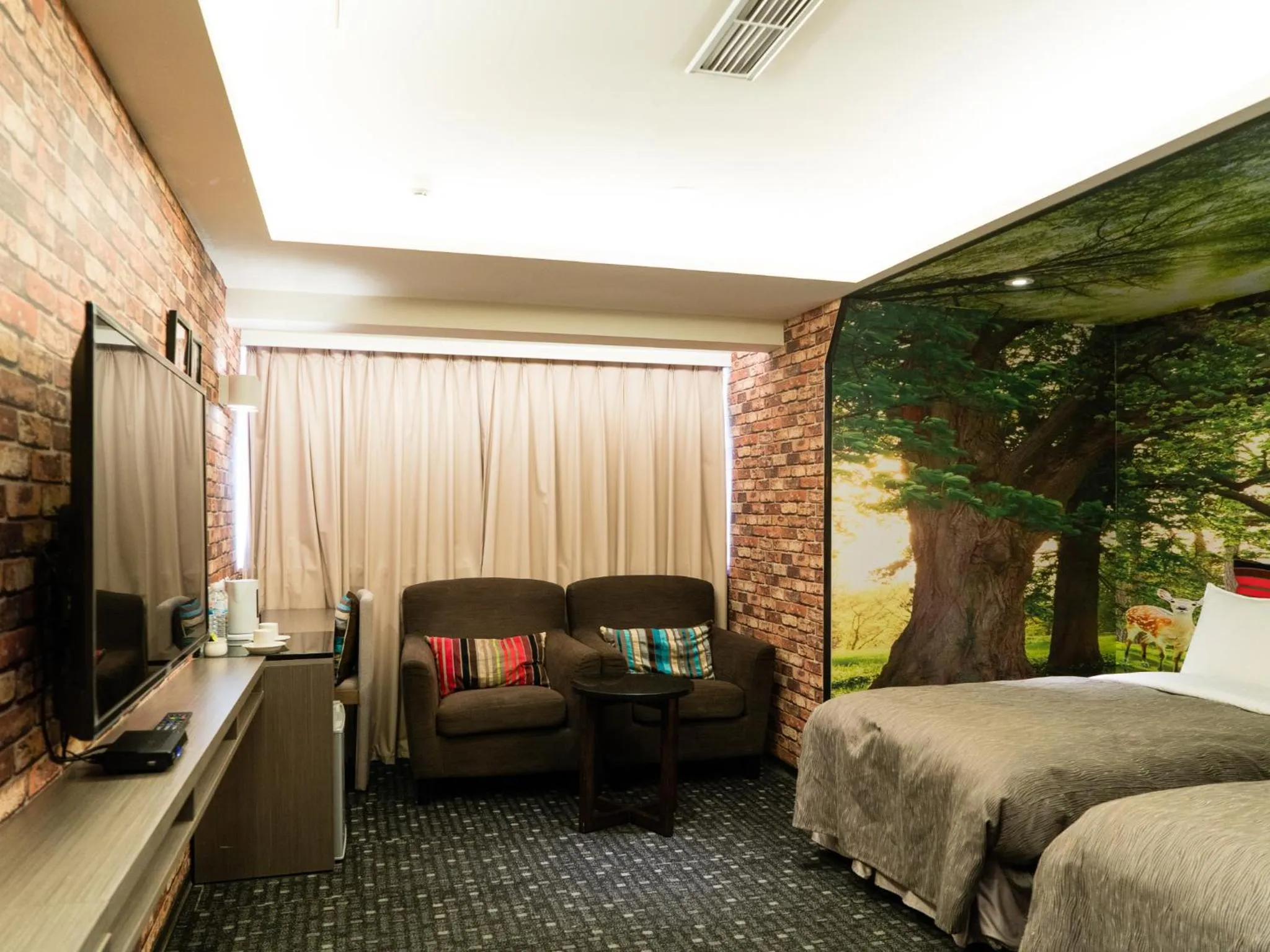 Bed in E-House Hotel