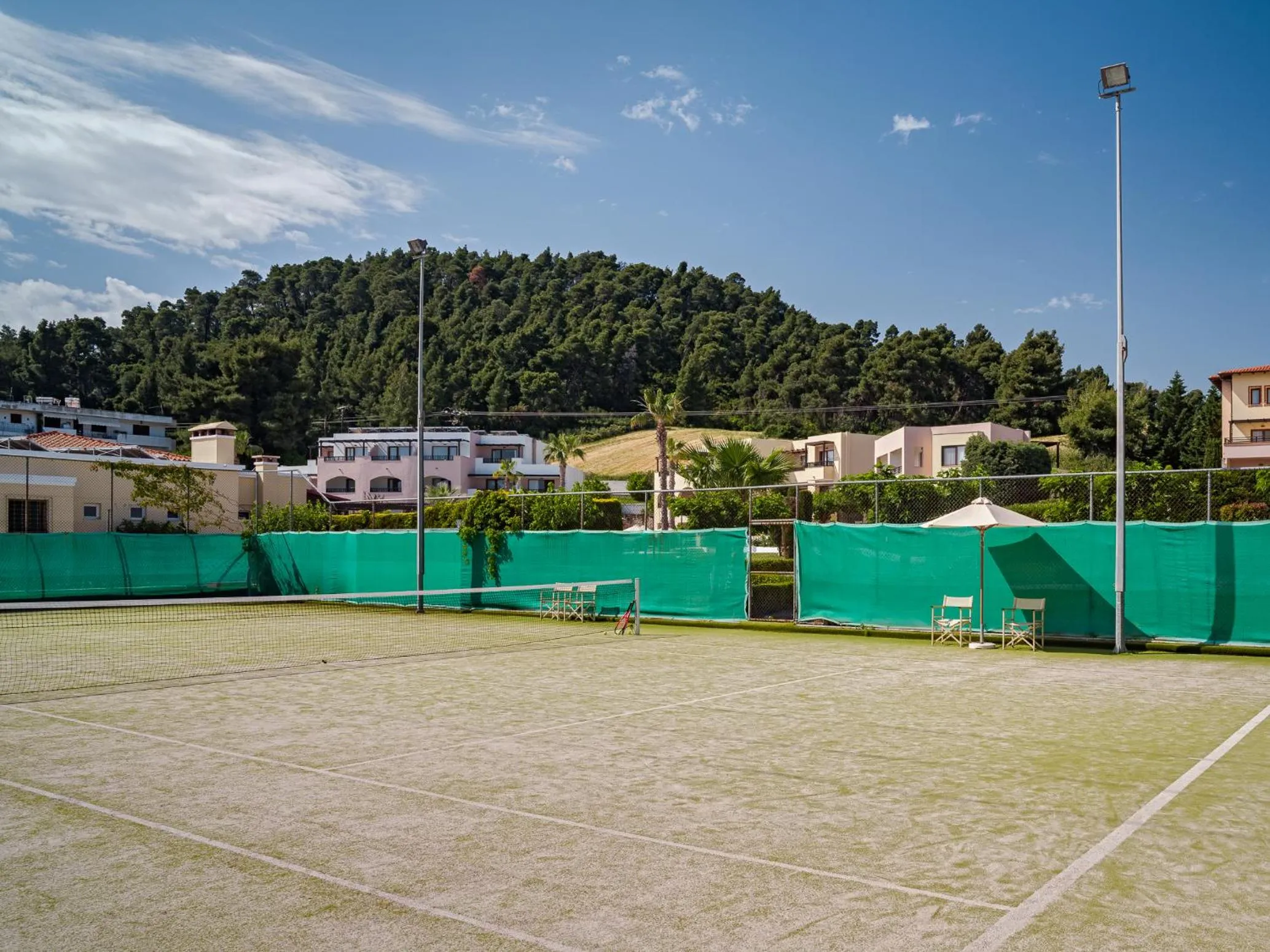 Tennis court in Aegean Melathron Thalasso Spa Hotel