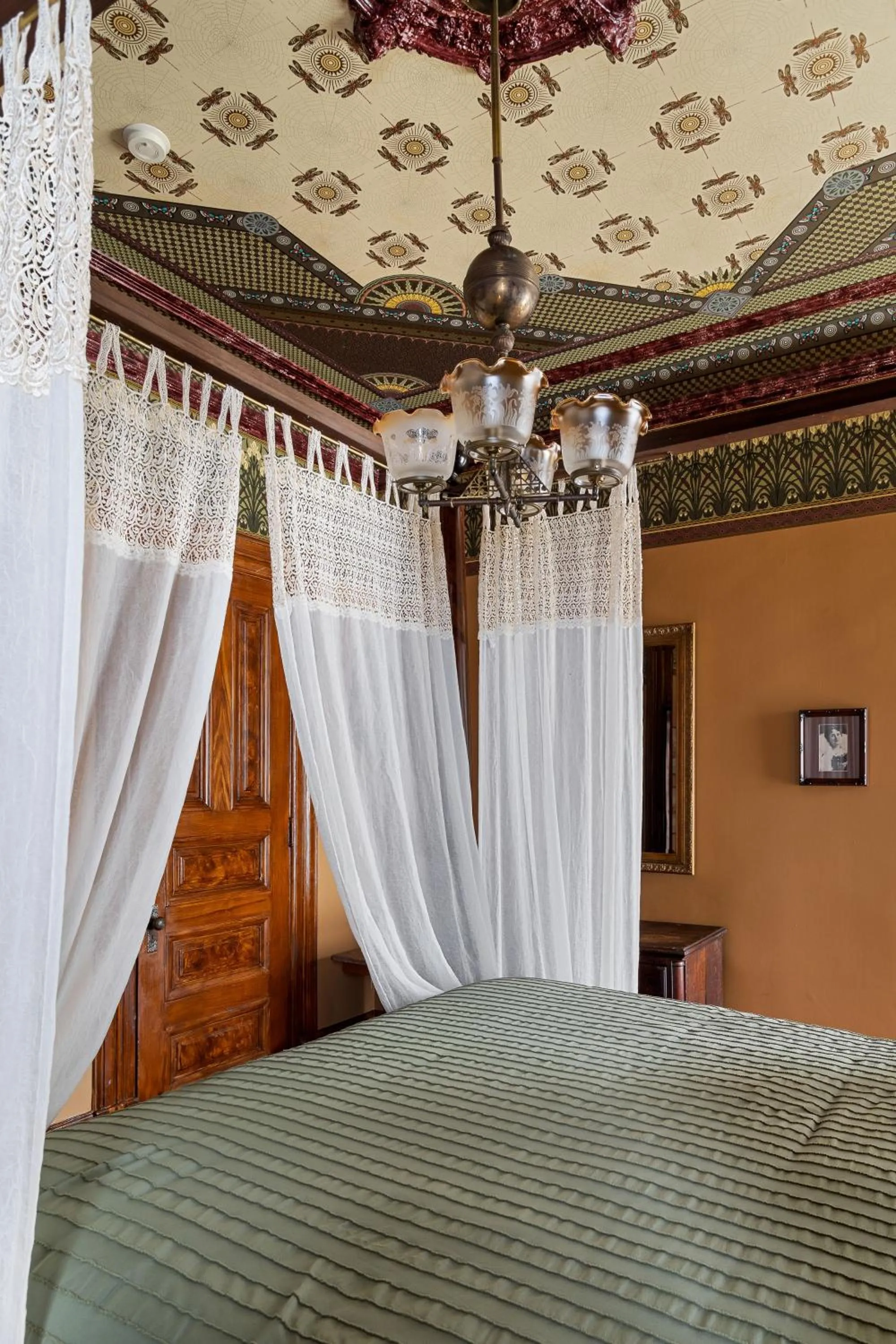 Bedroom in Chateau Tivoli Bed and Breakfast