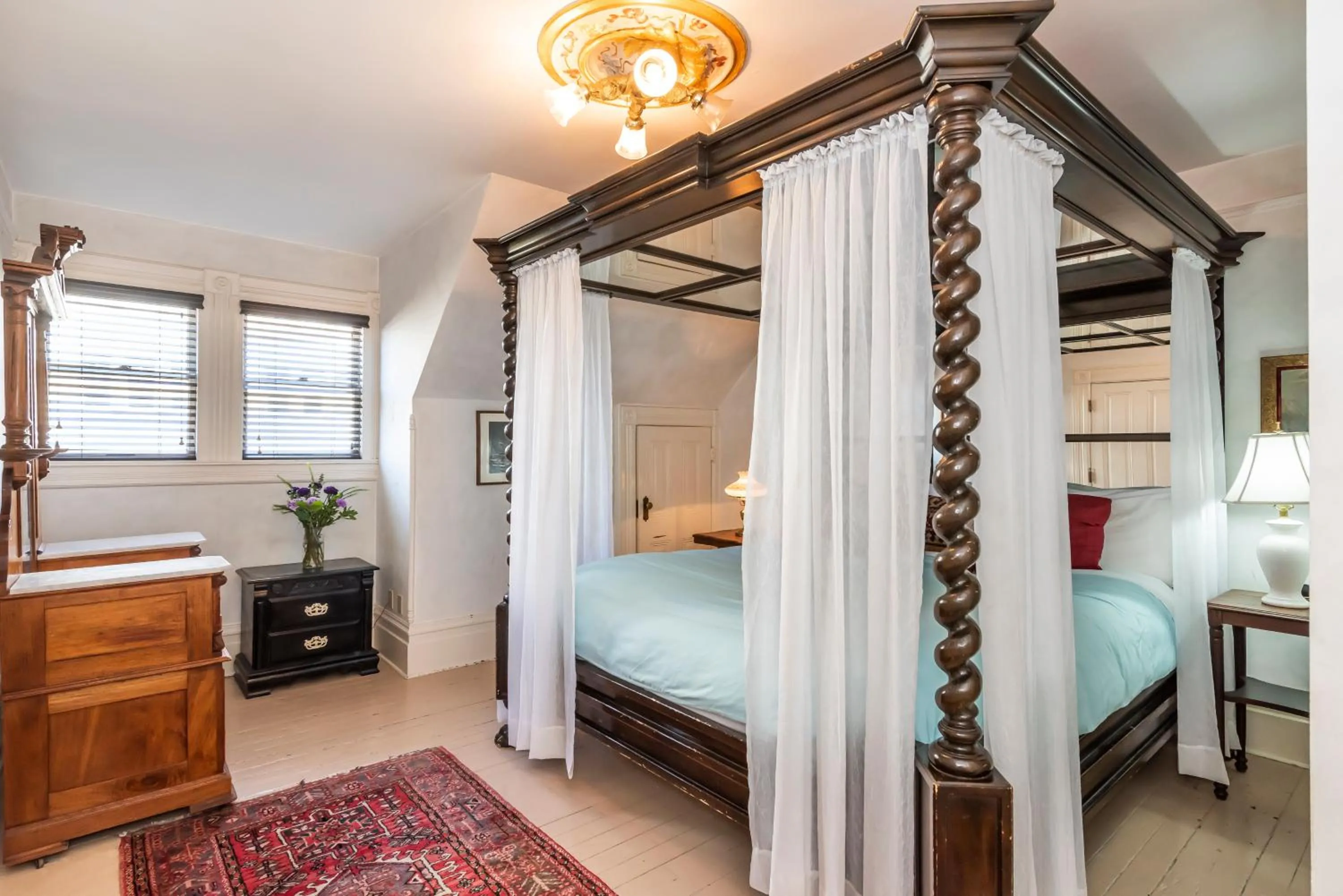 Bedroom in Chateau Tivoli Bed and Breakfast