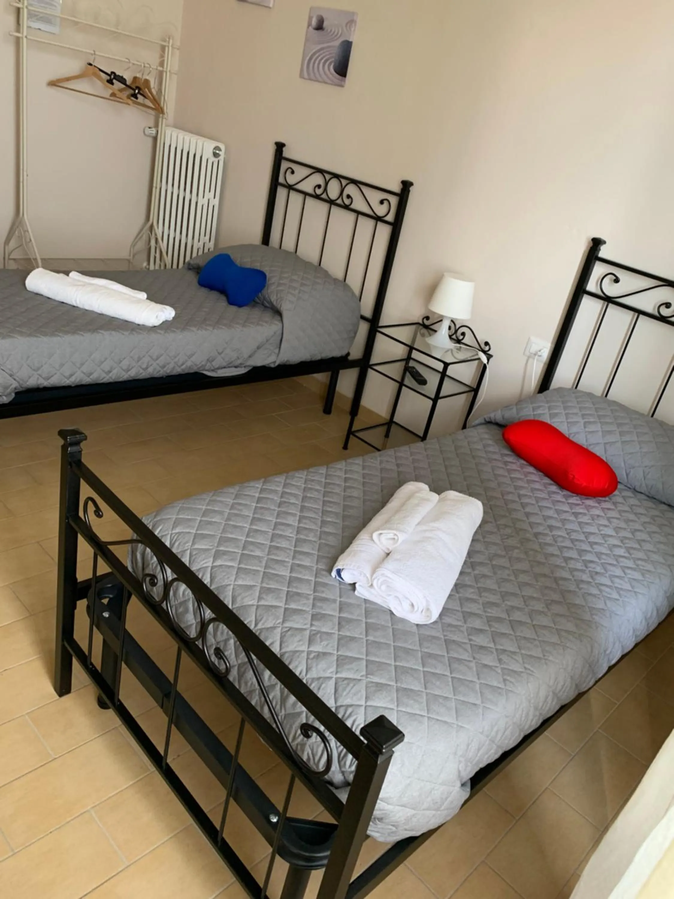 Photo of the whole room, Bed in La Mela Rosa