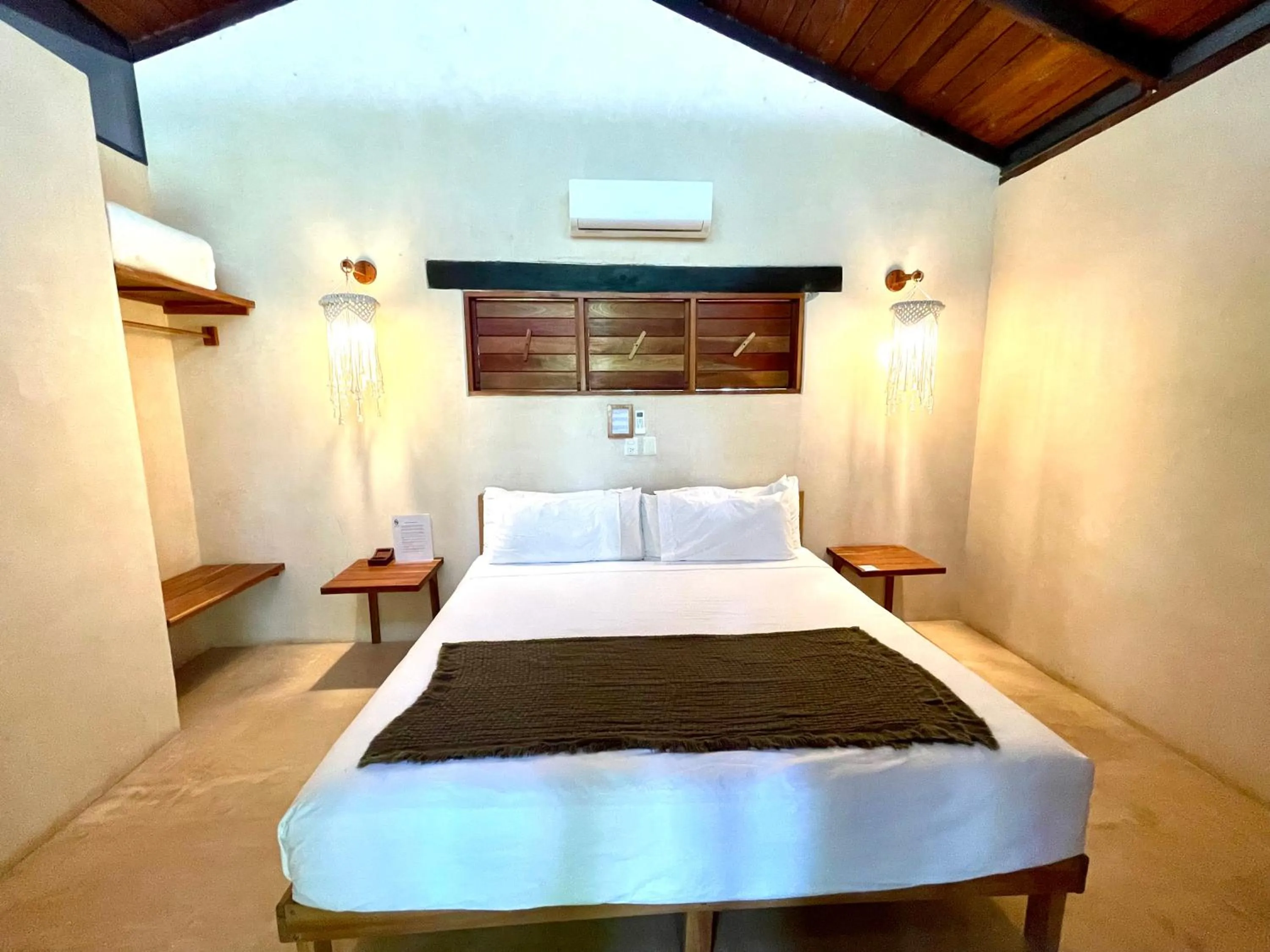 Bed in Hotel Buenavista Bacalar Jungle Experience