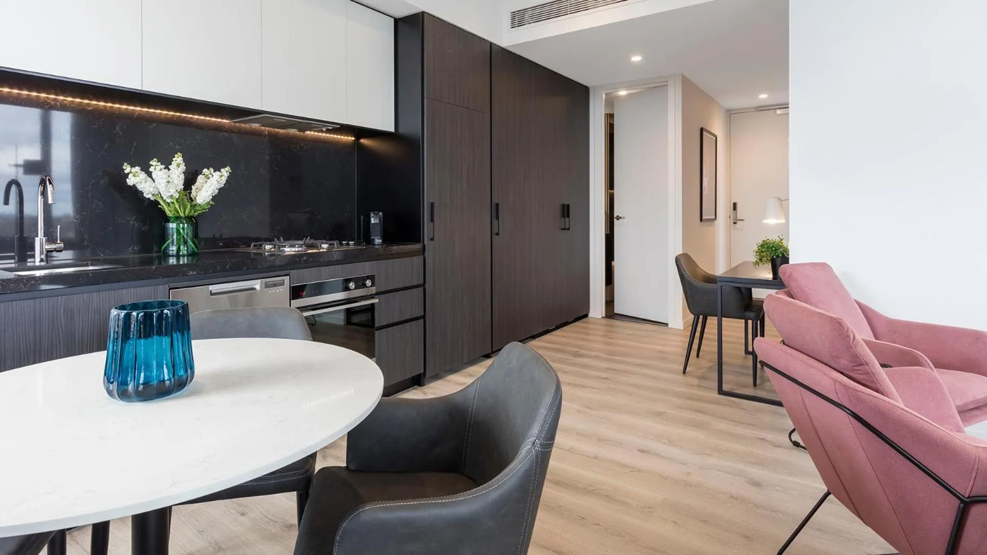 Seating area in Avani Melbourne Box Hill Residences