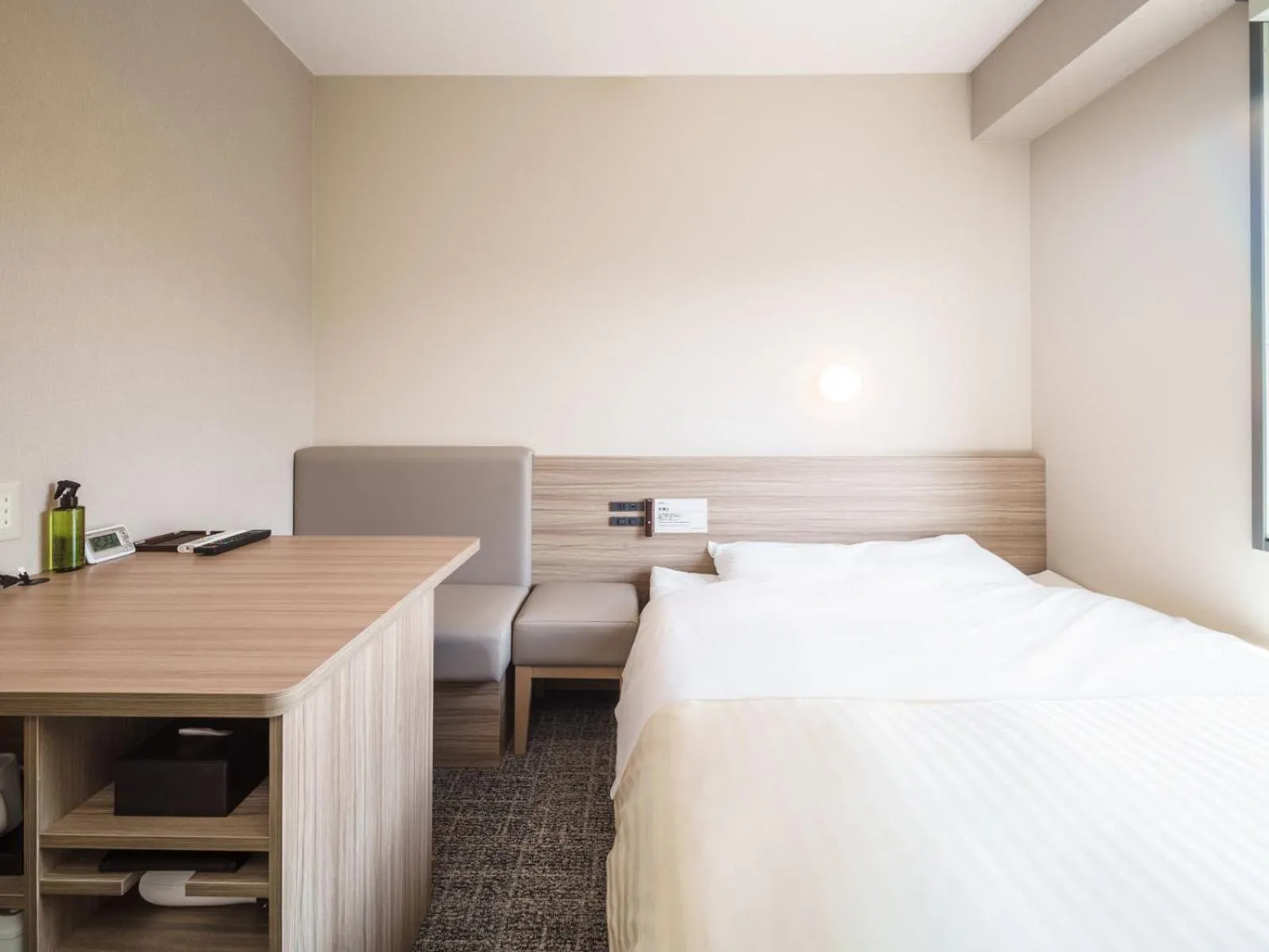 Bed in Super Hotel Anan Tomioka