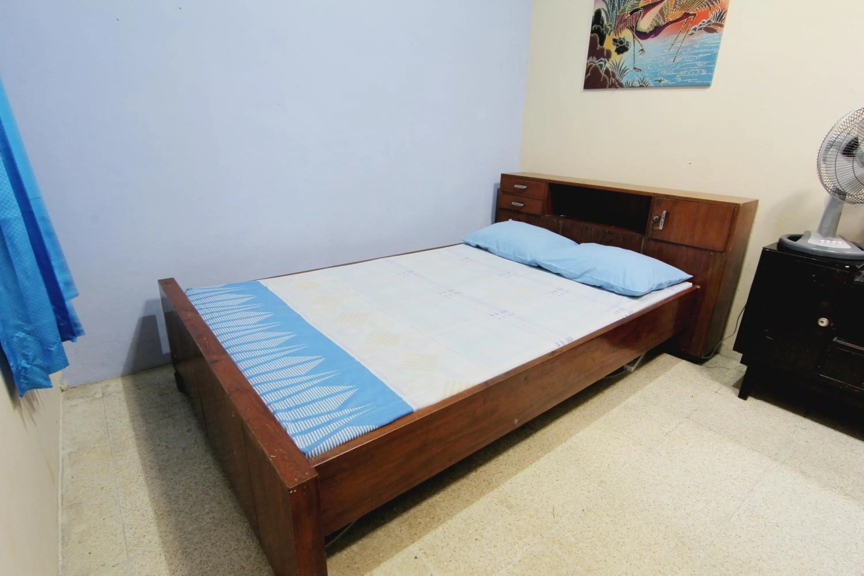 Bed in Batik Trinidar Homestay