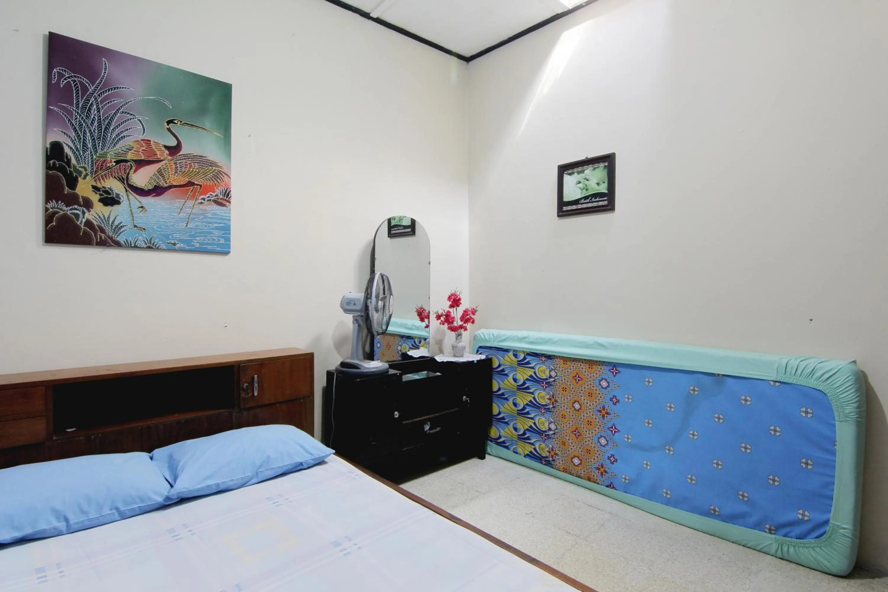 Bed in Batik Trinidar Homestay