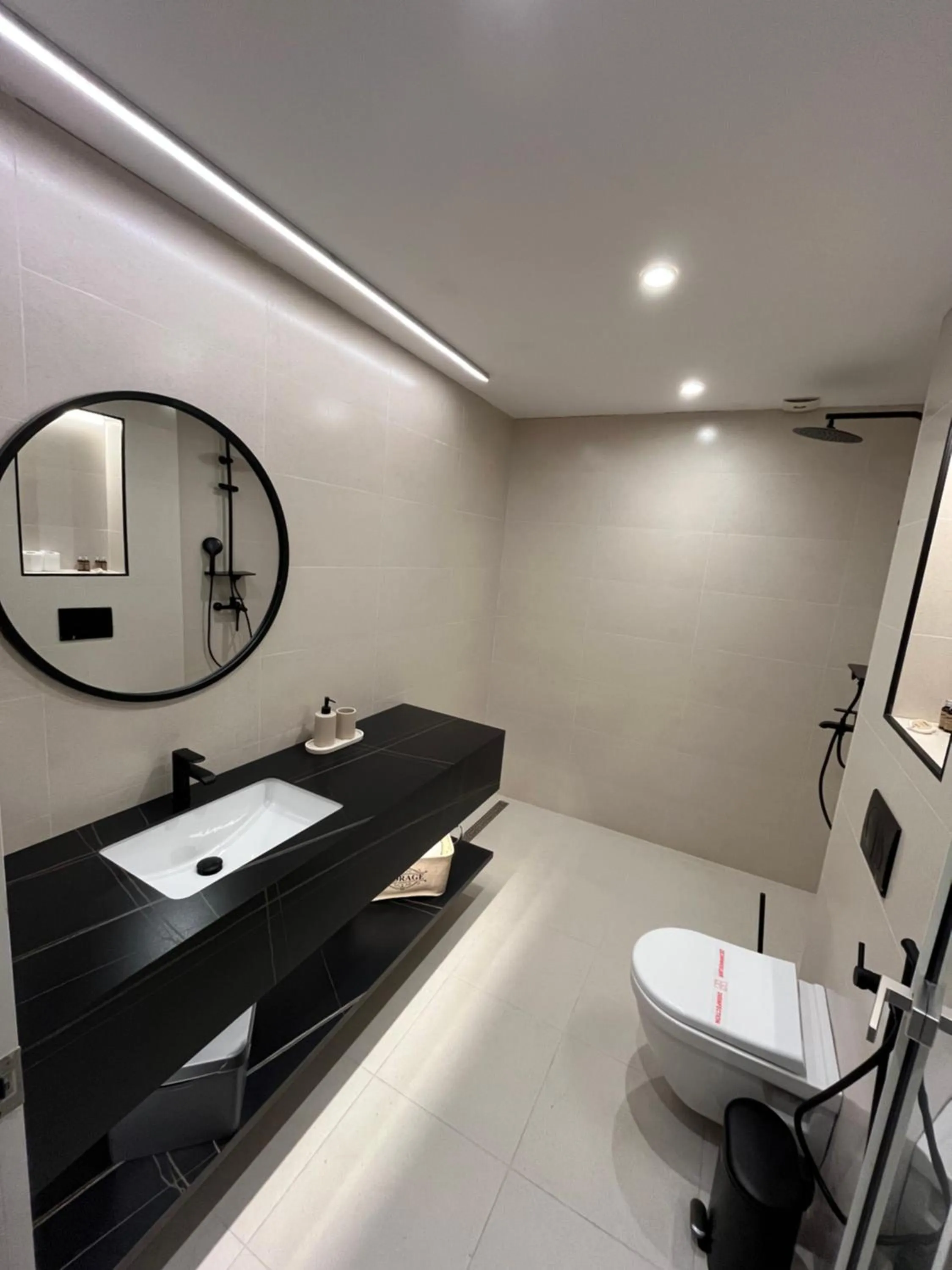 Bathroom in Lotus Family Hotel - Free Parking