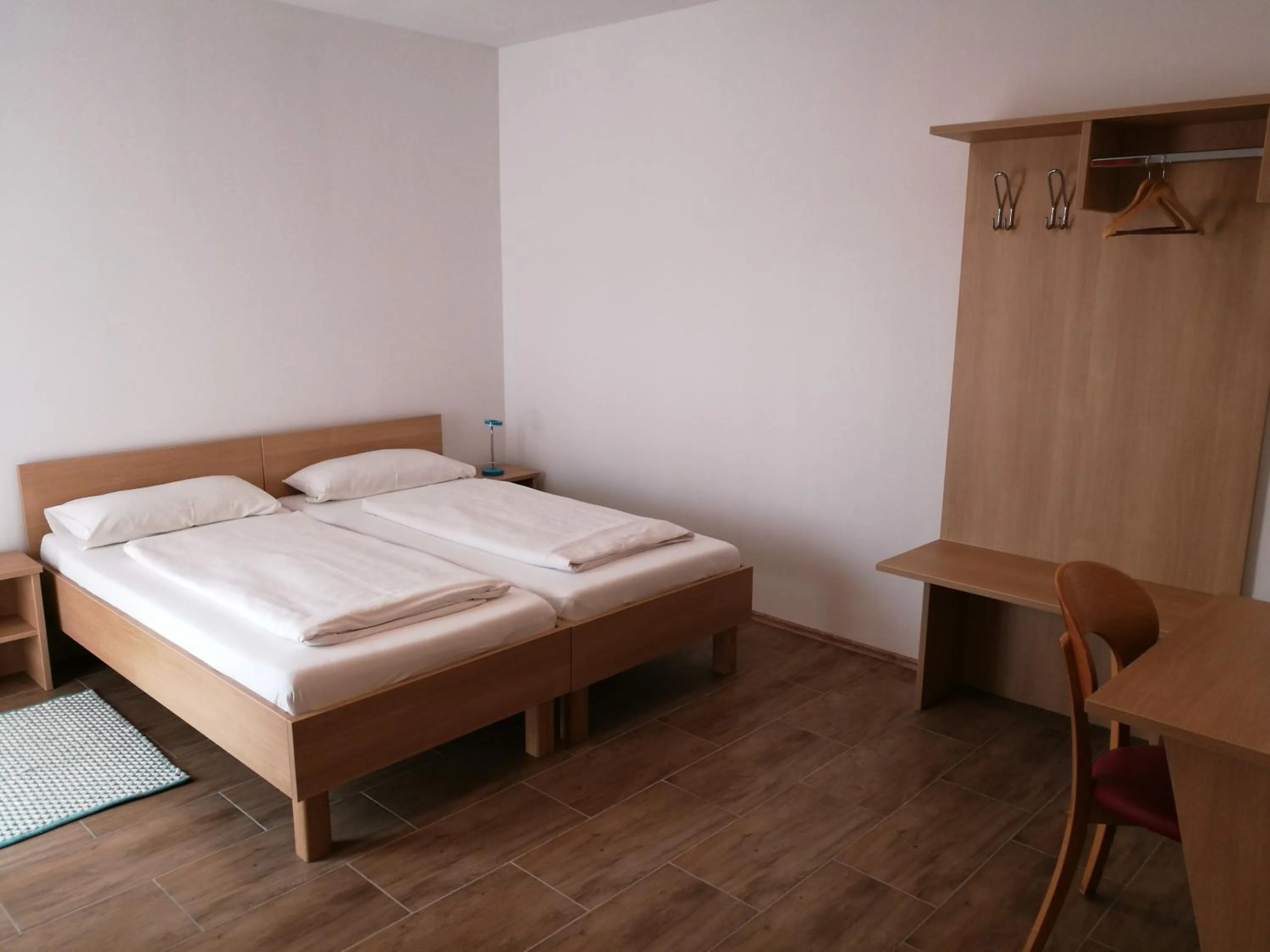 Bed in Dorf-Zimmer Mirth