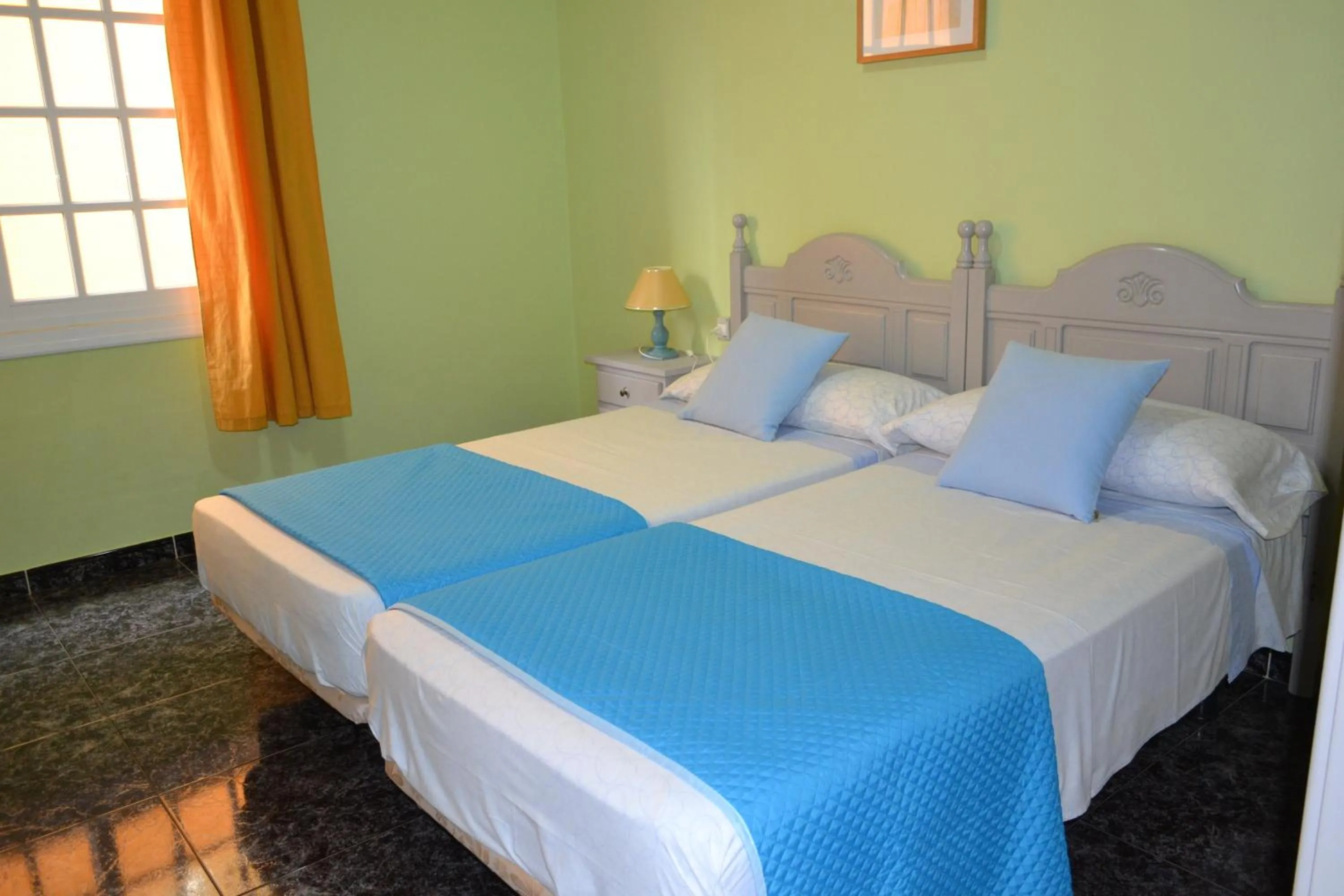 Bed in Apartamentos Casa Junonia