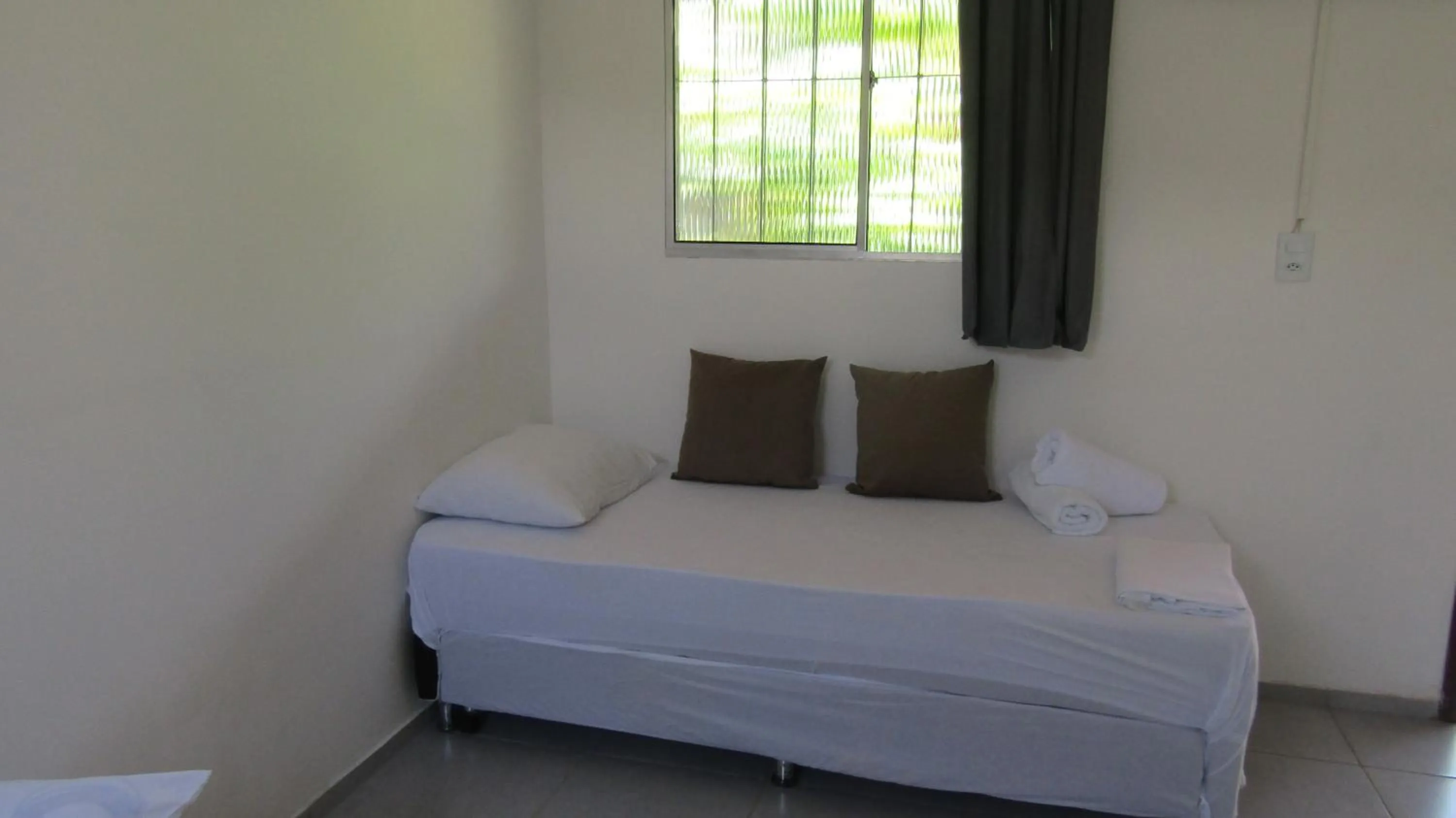 Bed in Pousada Lemos