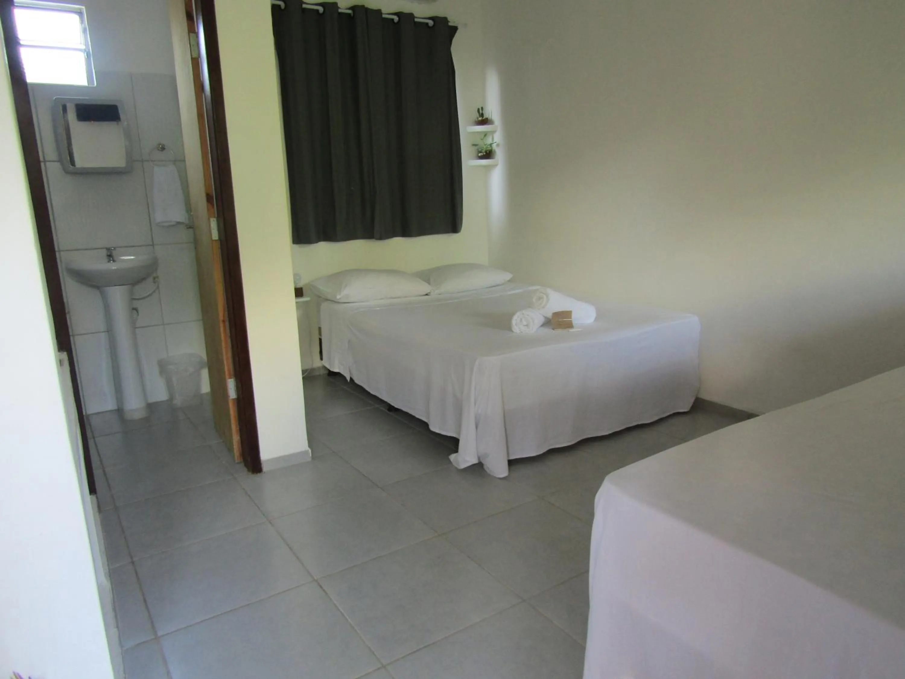 Photo of the whole room, Bed in Pousada Lemos