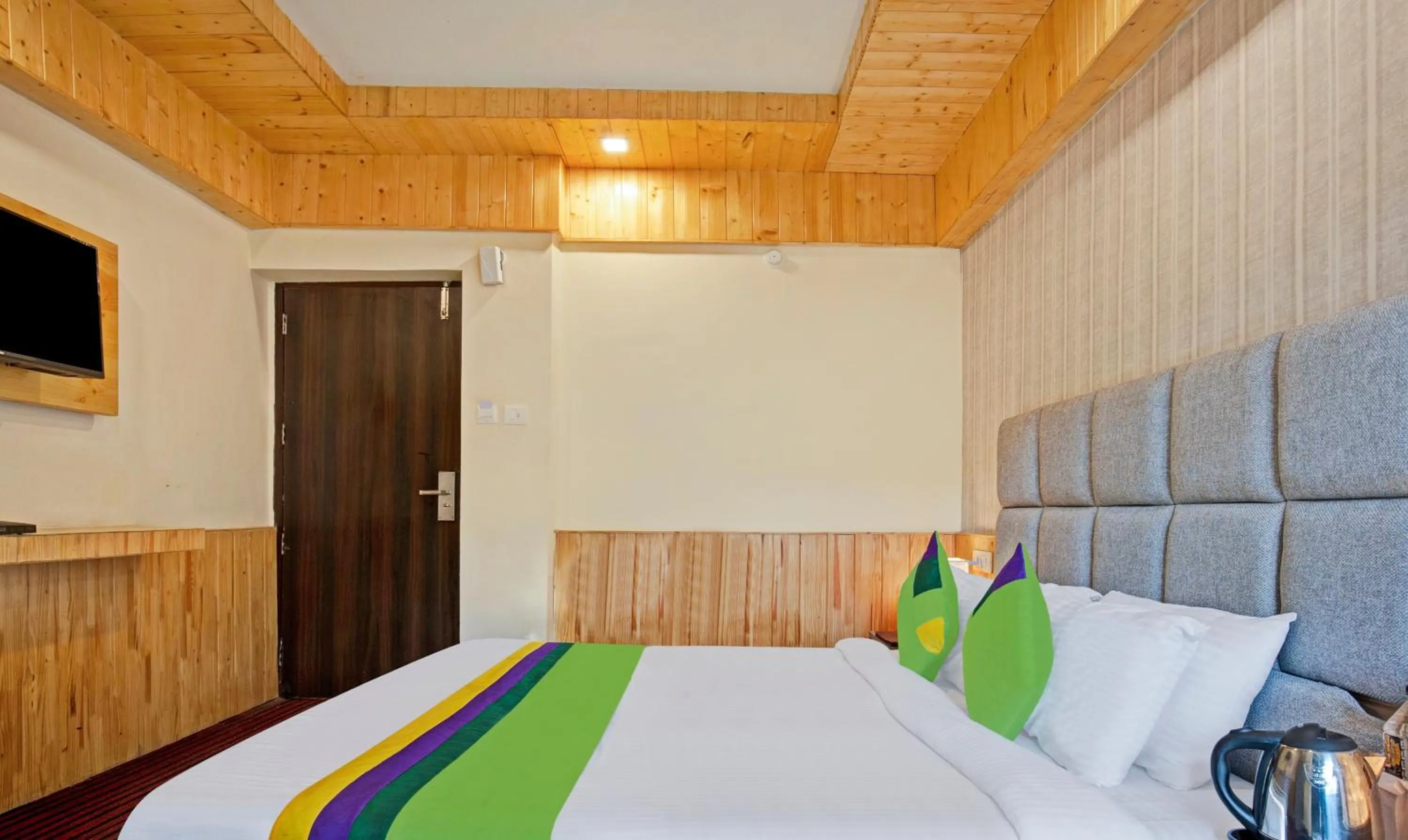 TV and multimedia, Bed in Treebo Kosmos Anamika, 1 Km From Nainital Lake