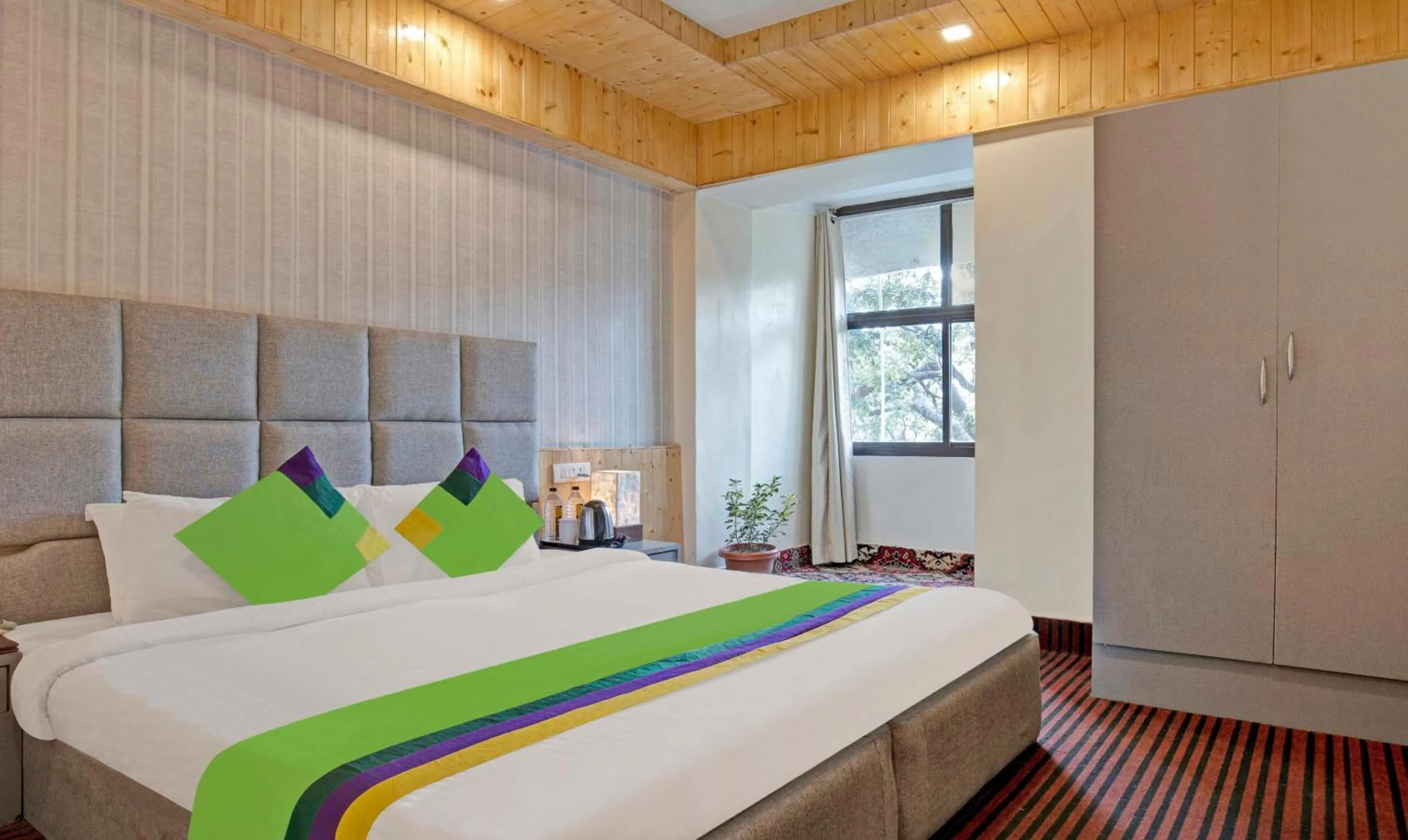 Bedroom, Bed in Treebo Kosmos Anamika, 1 Km From Nainital Lake