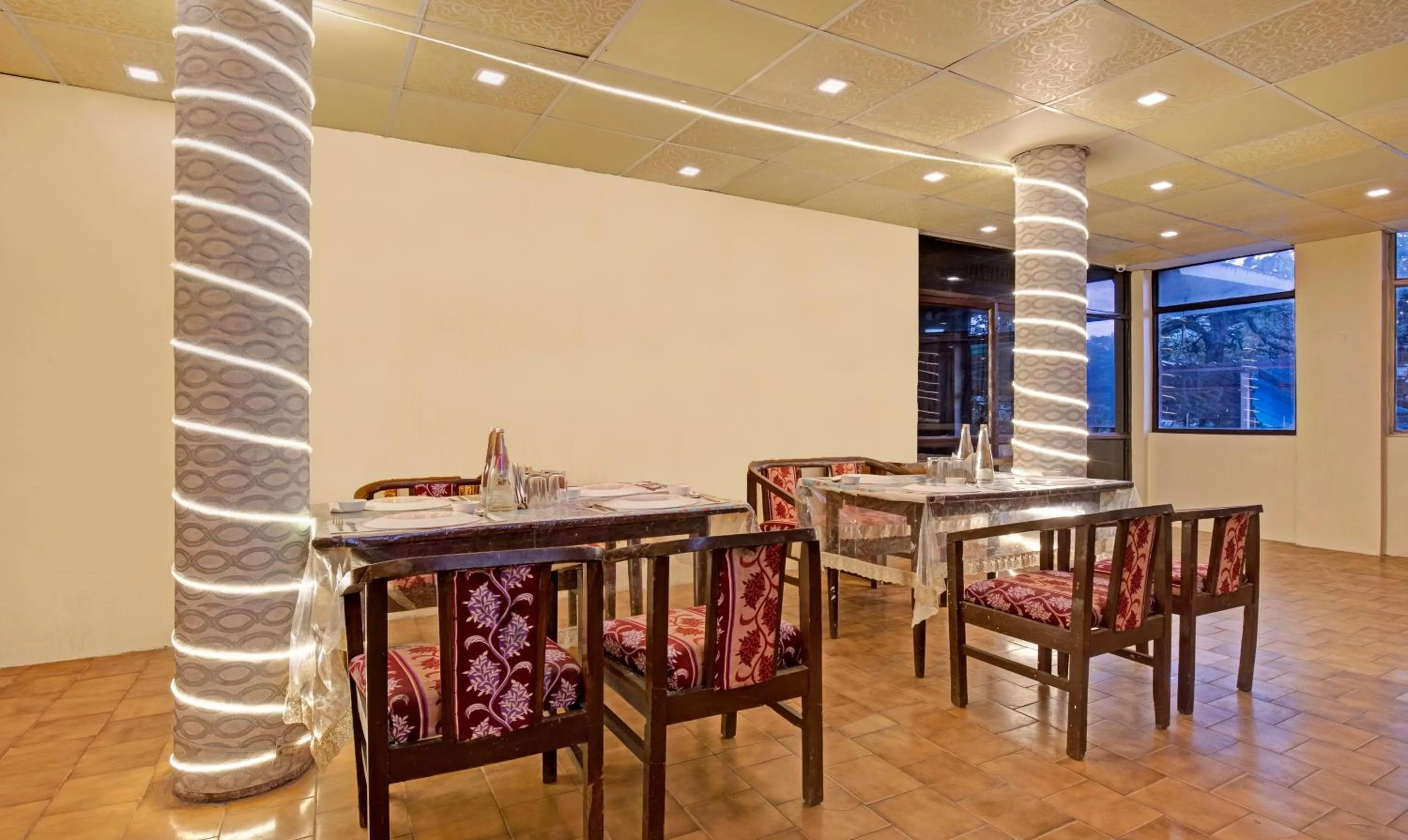 Dining area in Treebo Kosmos Anamika, 1 Km From Nainital Lake