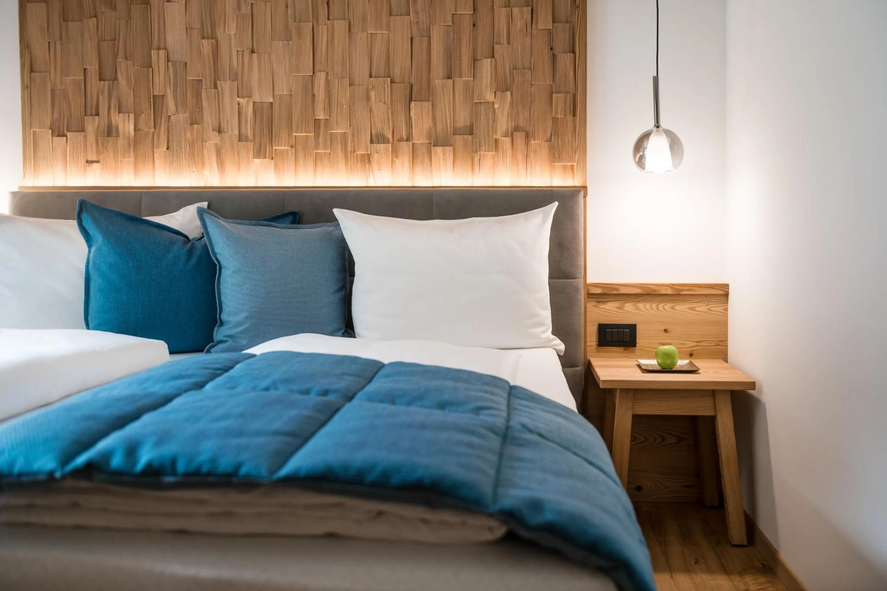 Bed in Les Dolomites Mountain Lodges