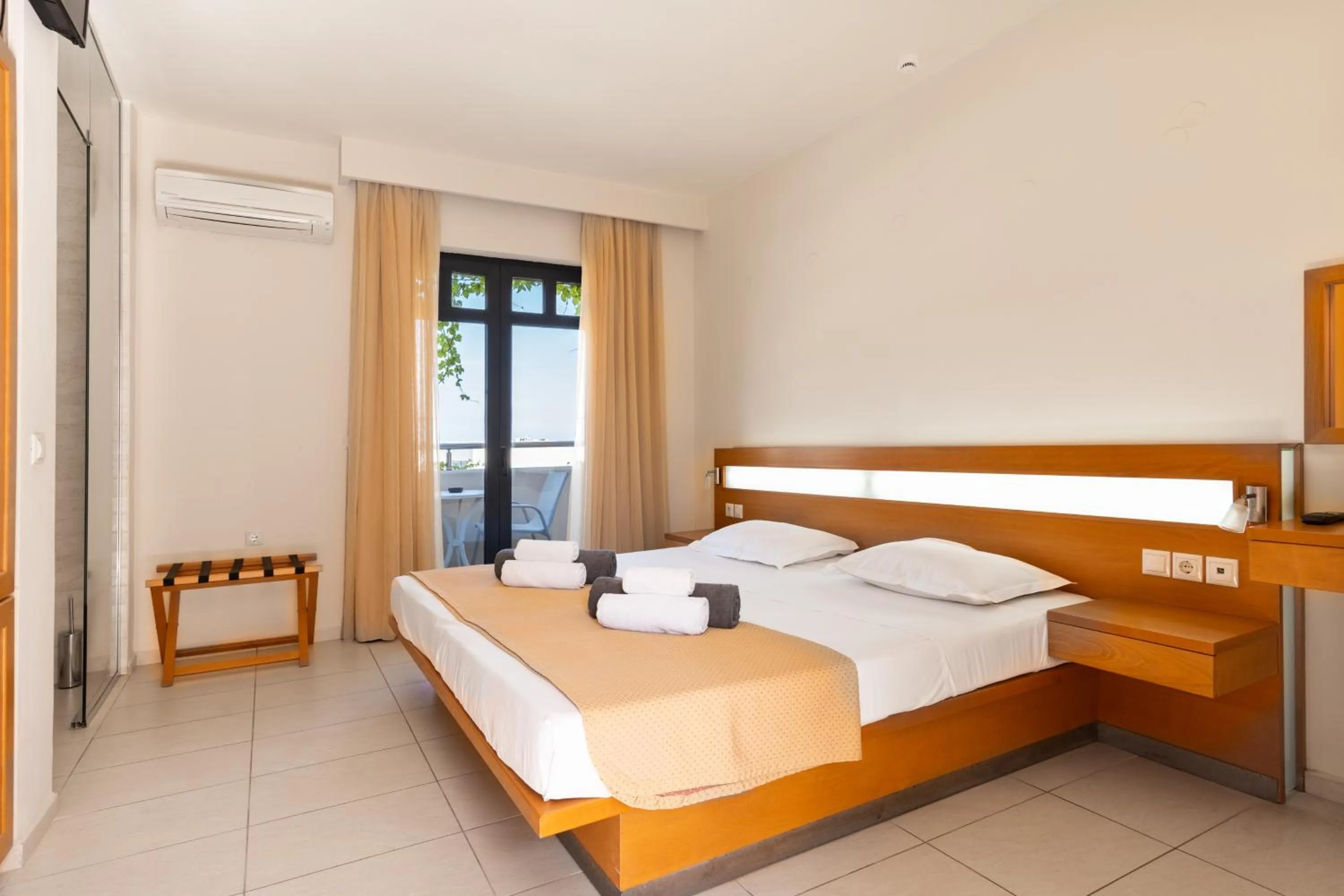 Photo of the whole room, Bed in Eva Bay Hotel On The Beach - Adults Only