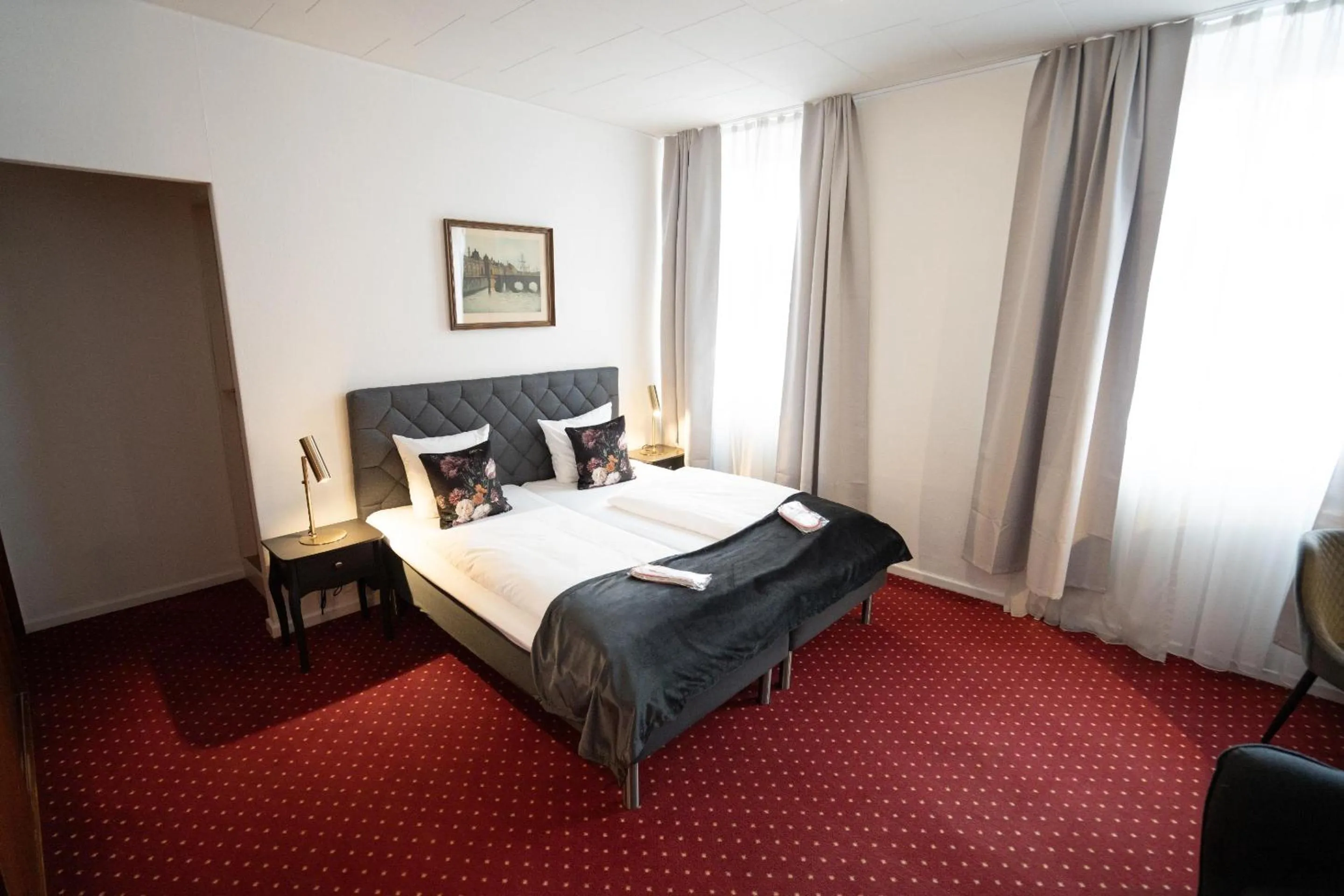 Bed in Hotel Vinhuset