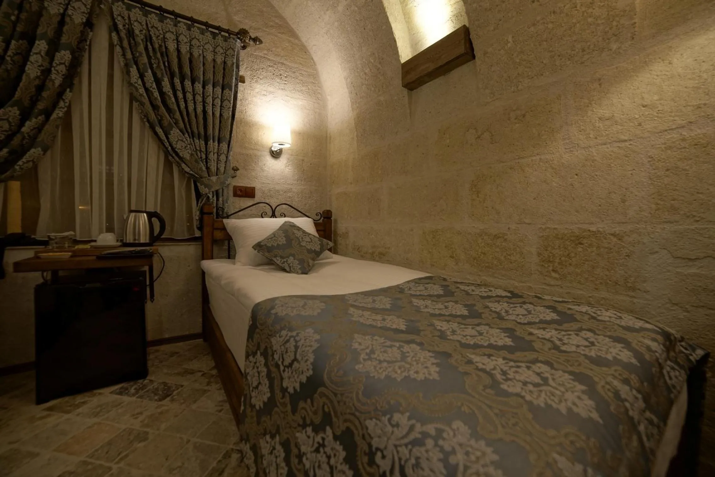 Bed in Arte Cave Hotel