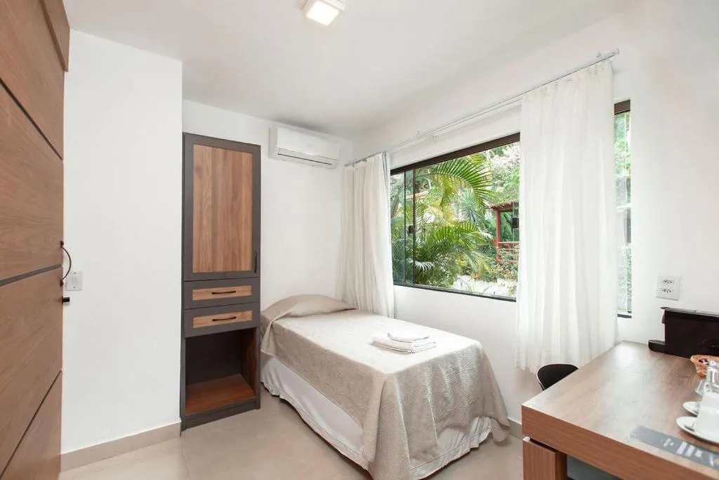 Bed in Angra Boutique Hotel