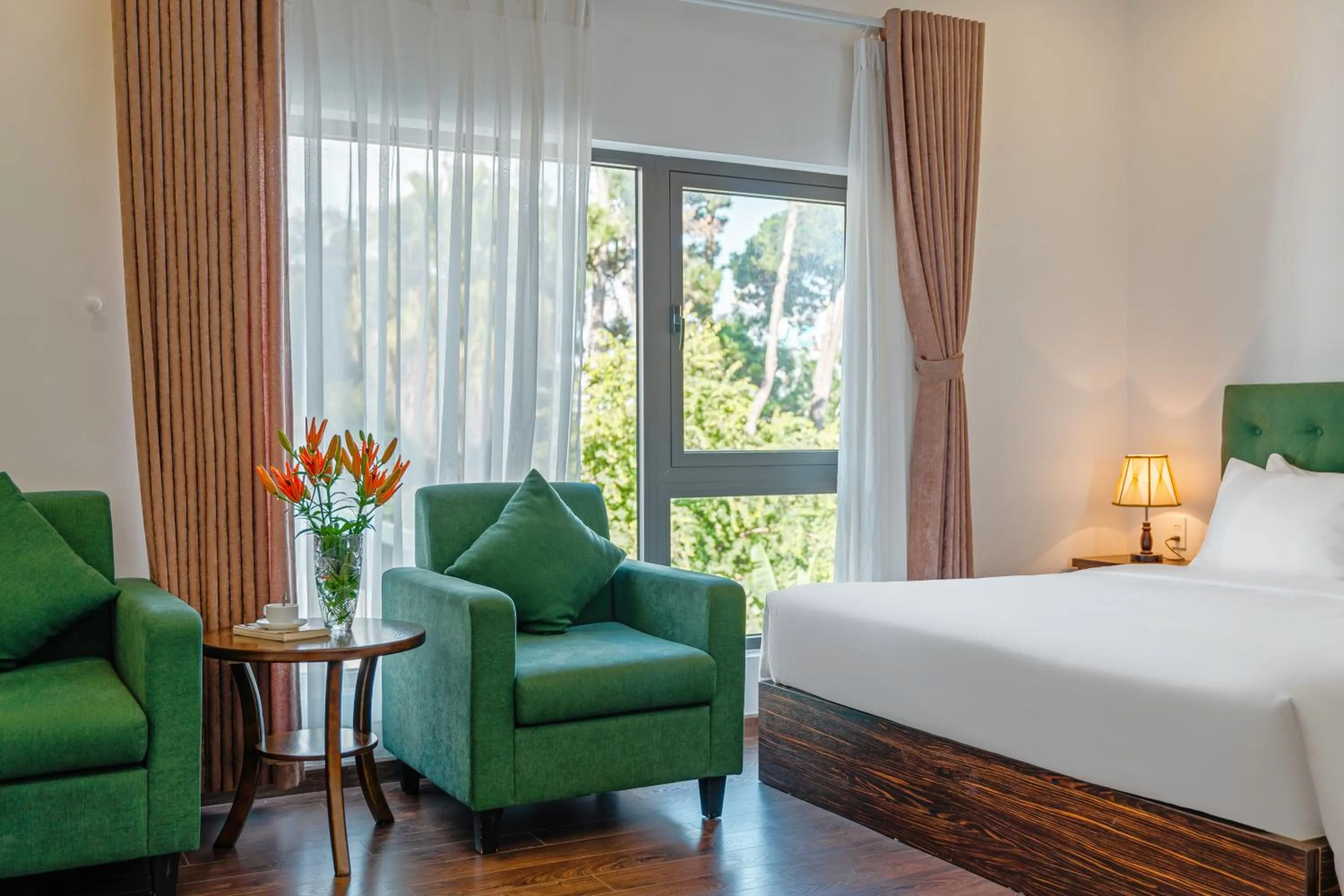 Bed in TTR Moonstone Apart Hotel