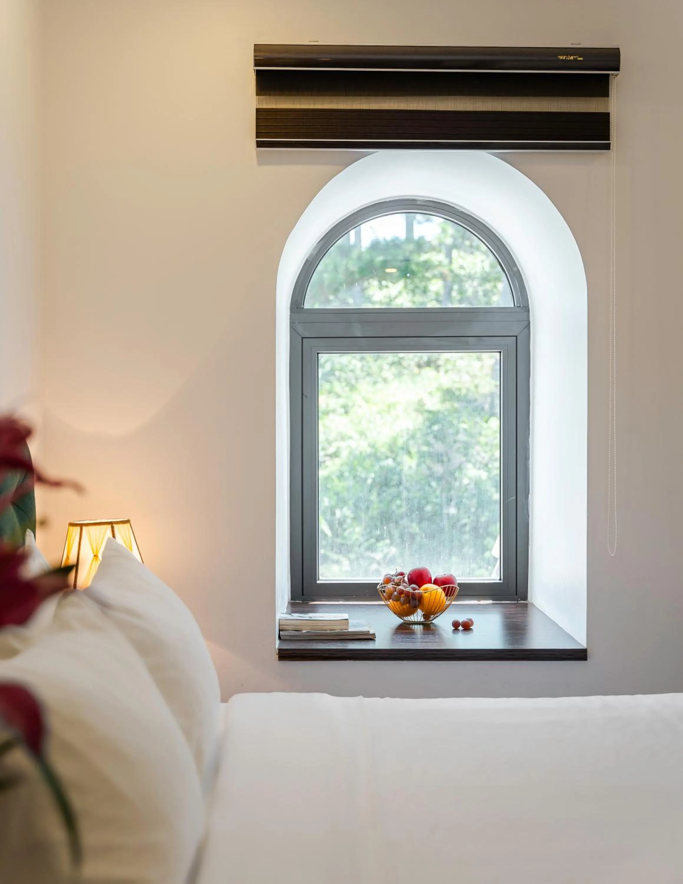 Bed in TTR Moonstone Apart Hotel