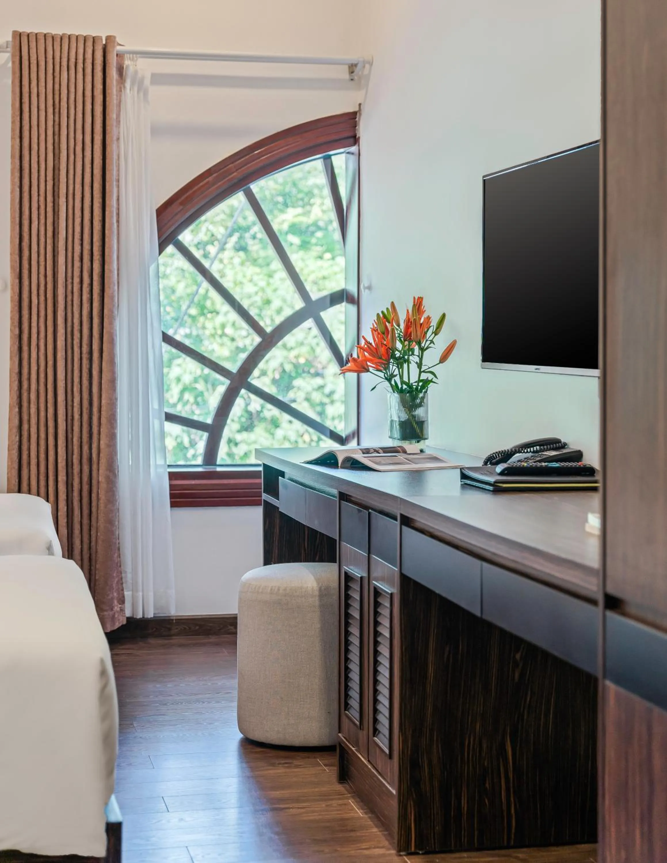 Bed in TTR Moonstone Apart Hotel