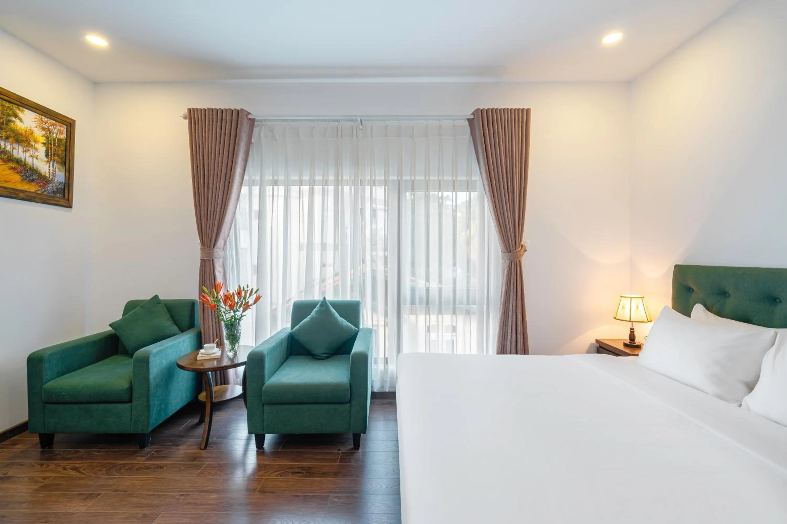 Bed in TTR Moonstone Apart Hotel